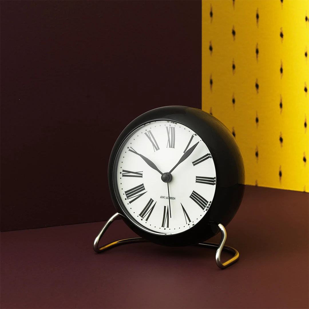 Table clock Ø11 cm from Arne Jacobsen in White/Black color, made of Plastic