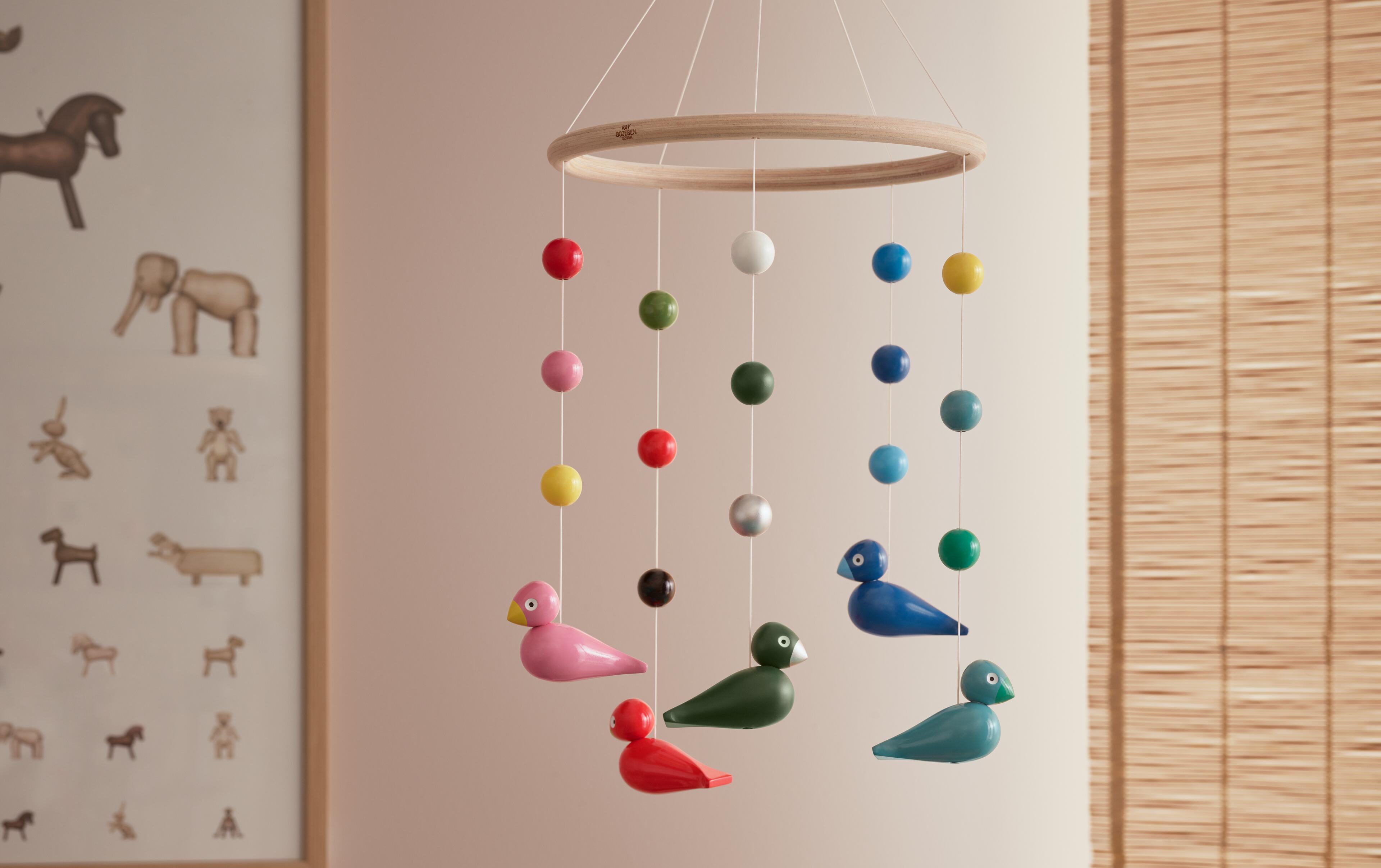 Gift ideas for maternity leave. Kay Bojesen bird mobile and poster featuring Kay Bojesen motifs