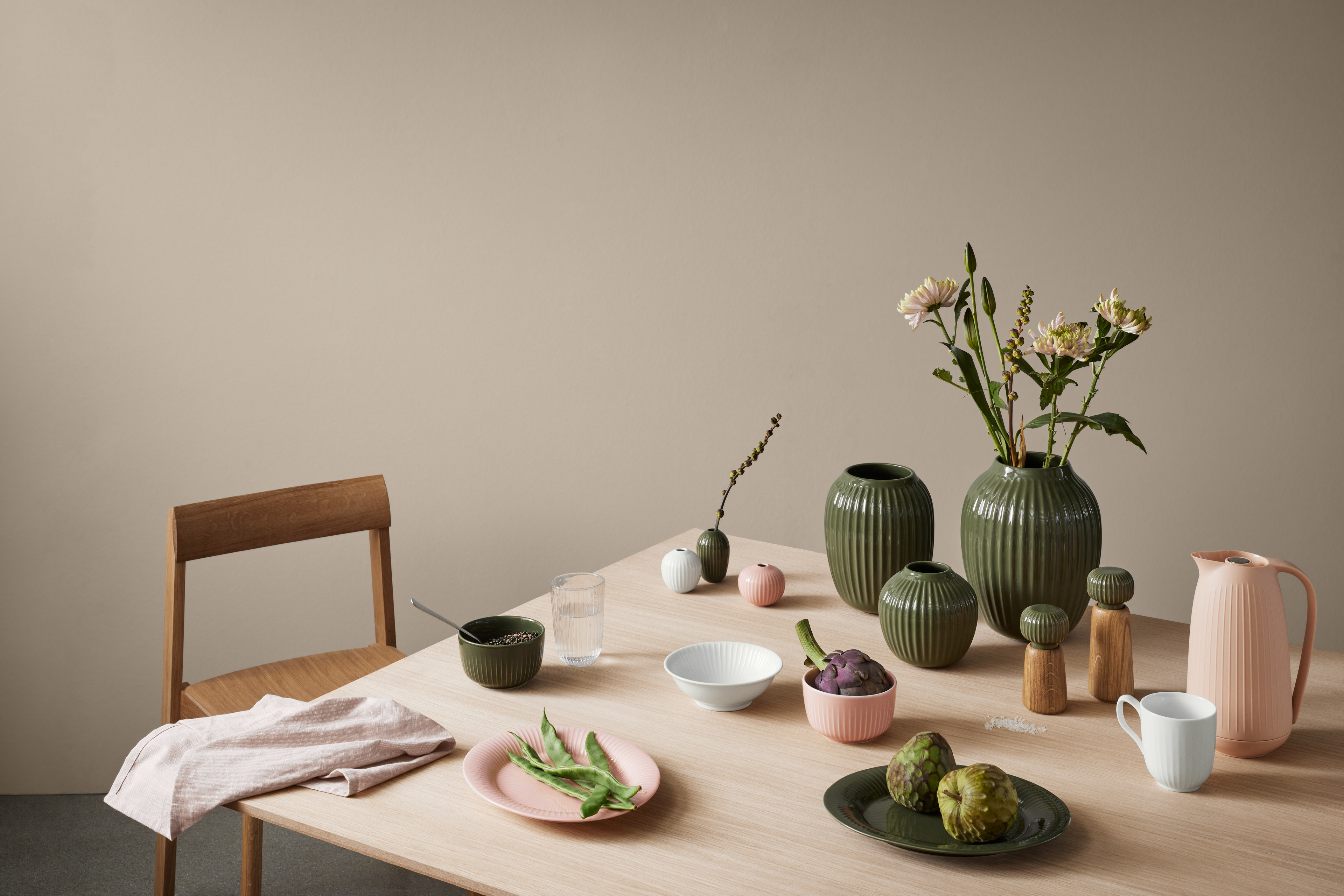 Vases, thermos, salt and pepper sets, bowls, plates and more from Kähler on table