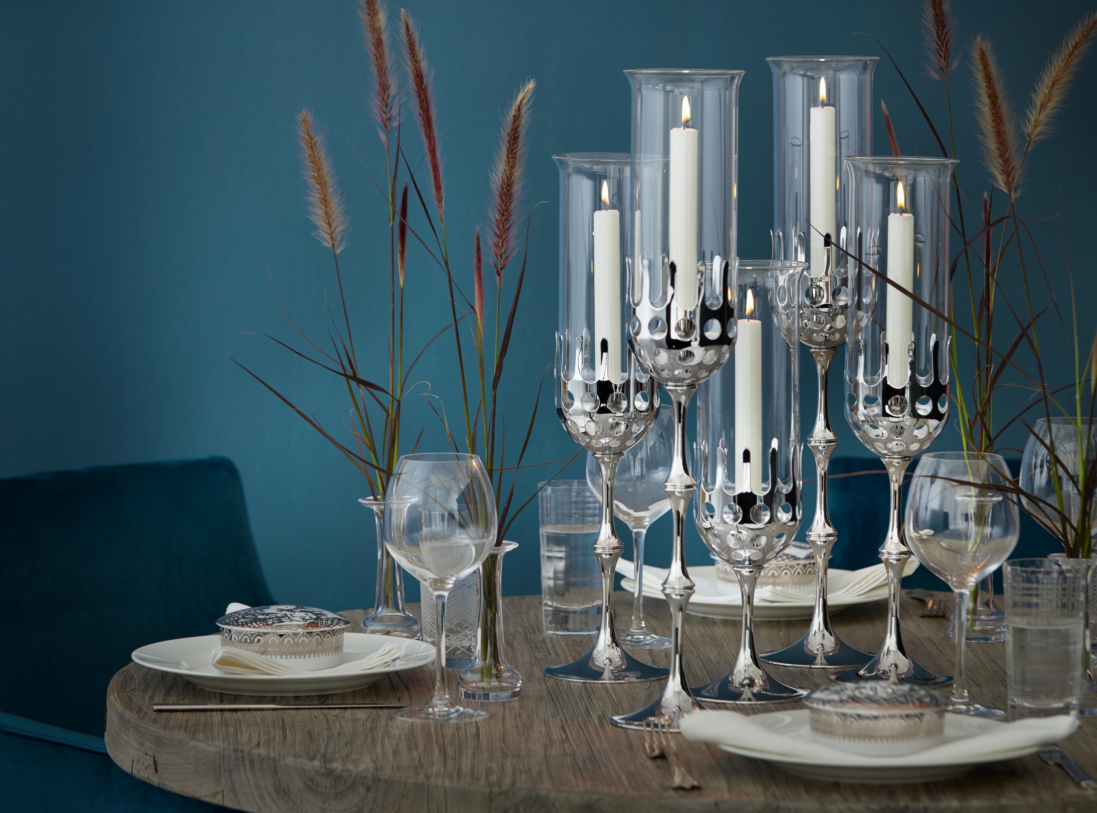 Sumptuous candlesticks from Bjørn Wiinblad on table