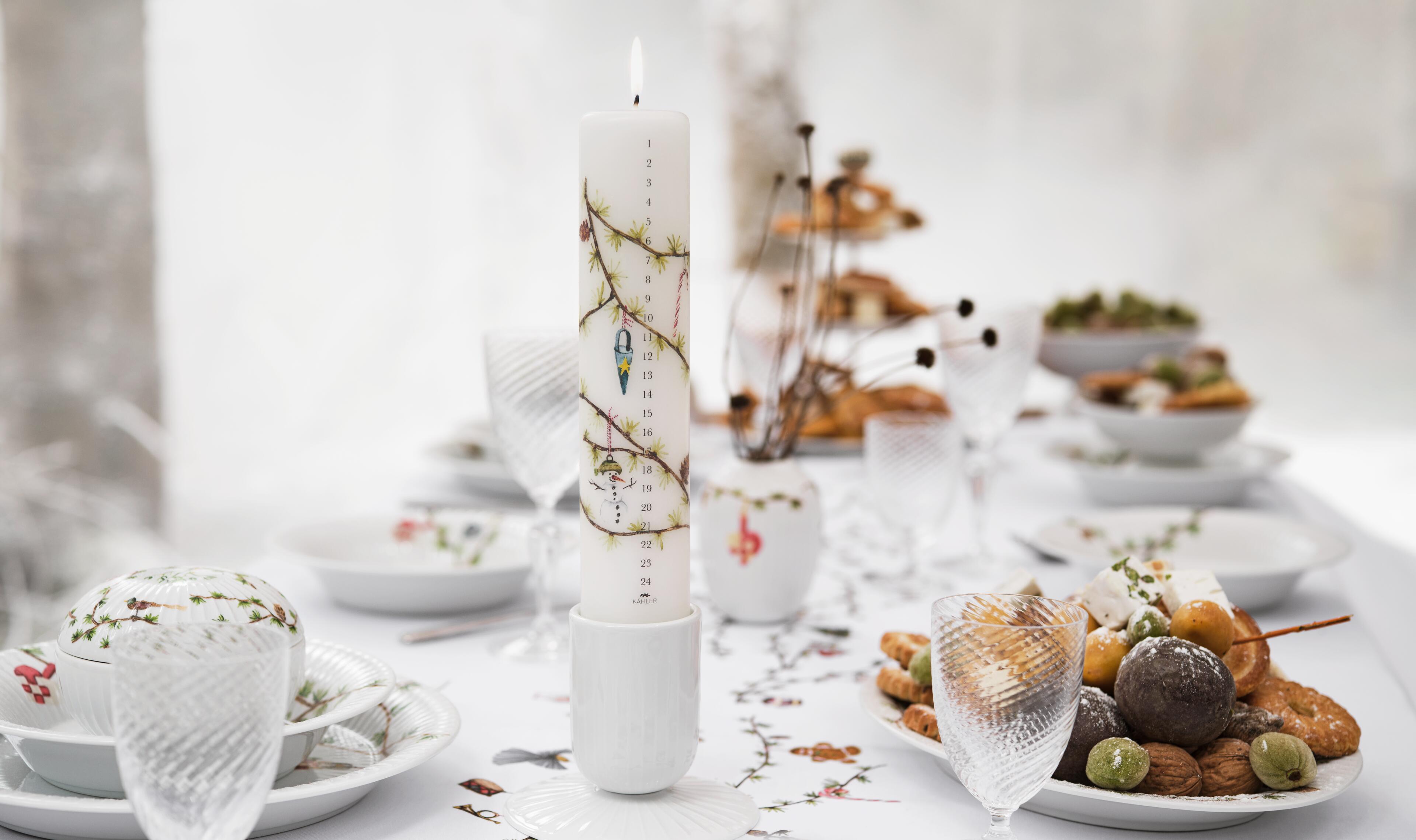 Advent candle from Kähler Design. Kähler pillar candleholders, vases, tableware with Christmas motifs.