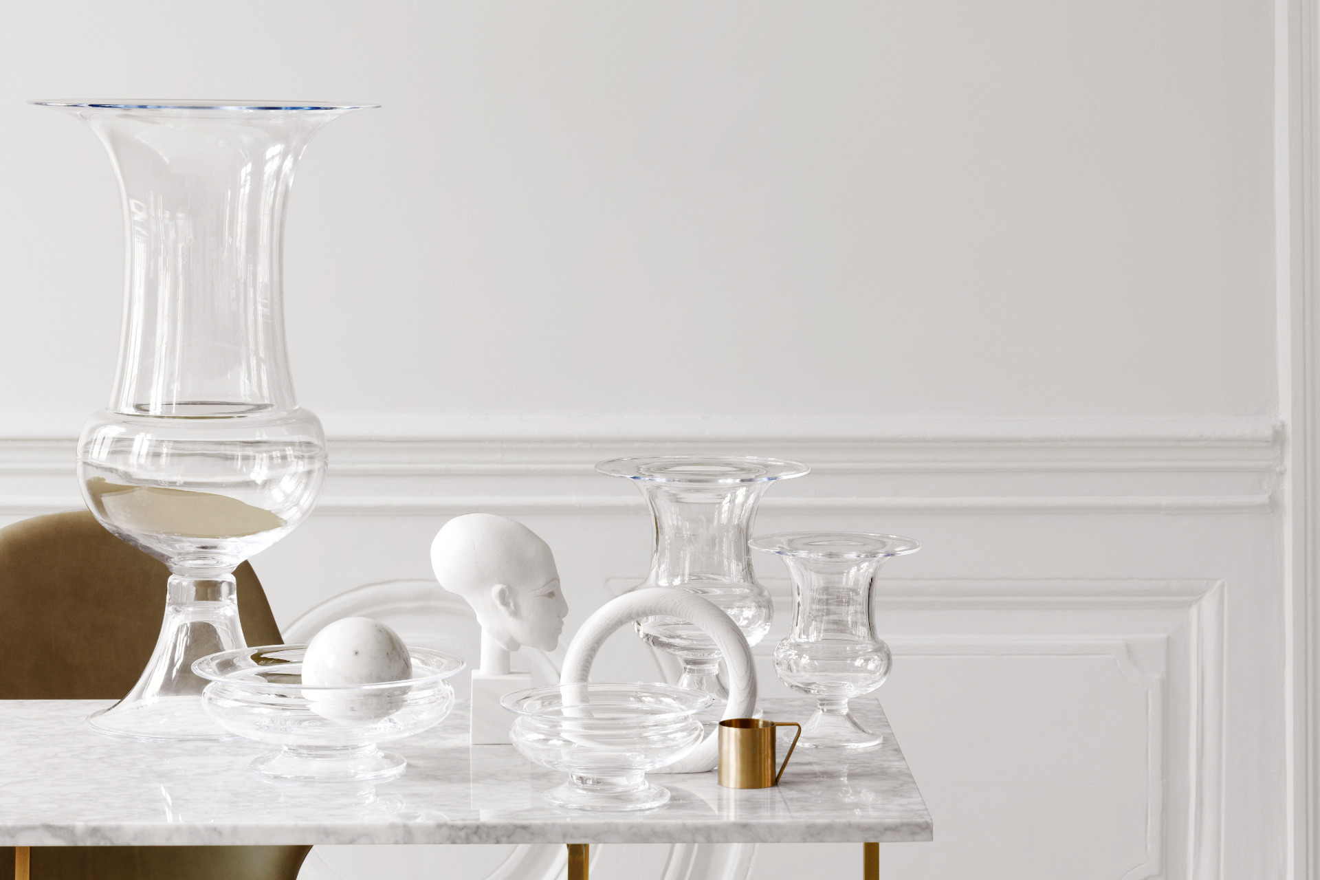 Vases and glasses on tables in the Old English series from Holmegaard