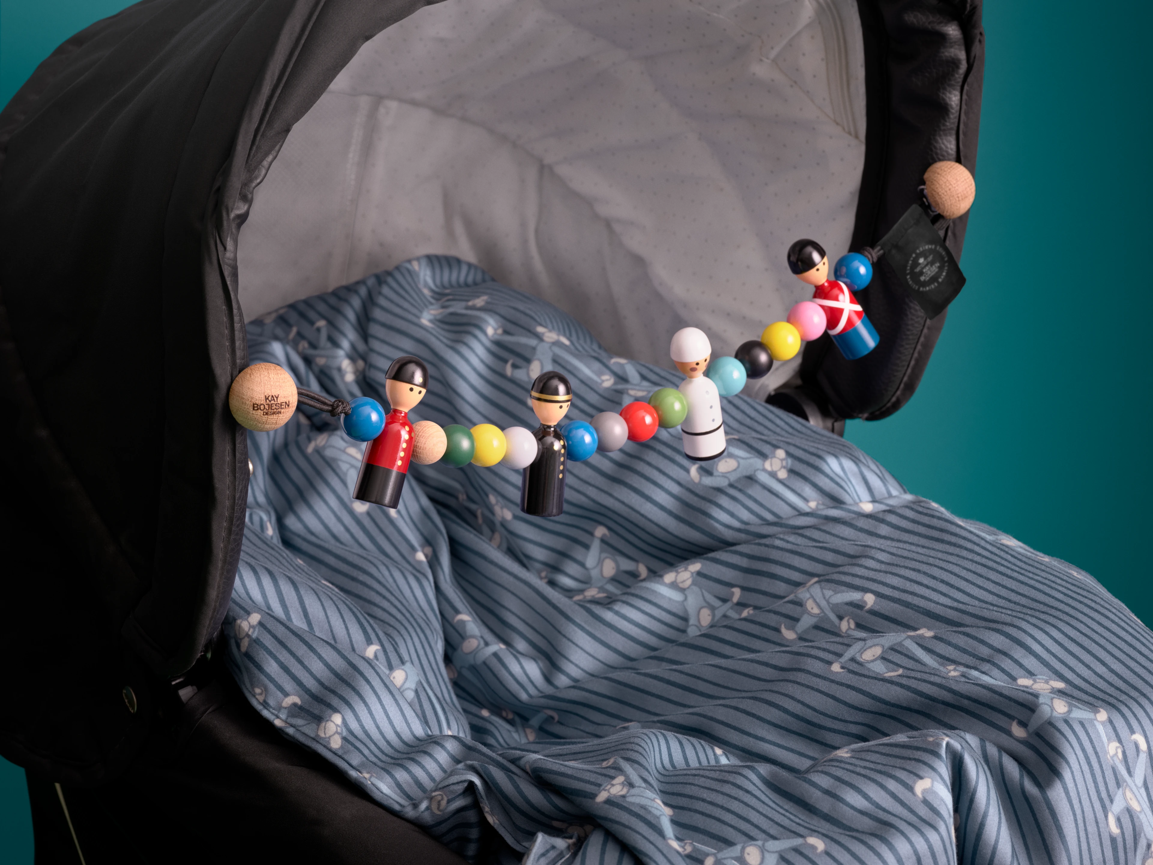 Kinderwagenkette H10.5 von Kay Bojesen in der Farbe Multi, hergestellt aus Holz