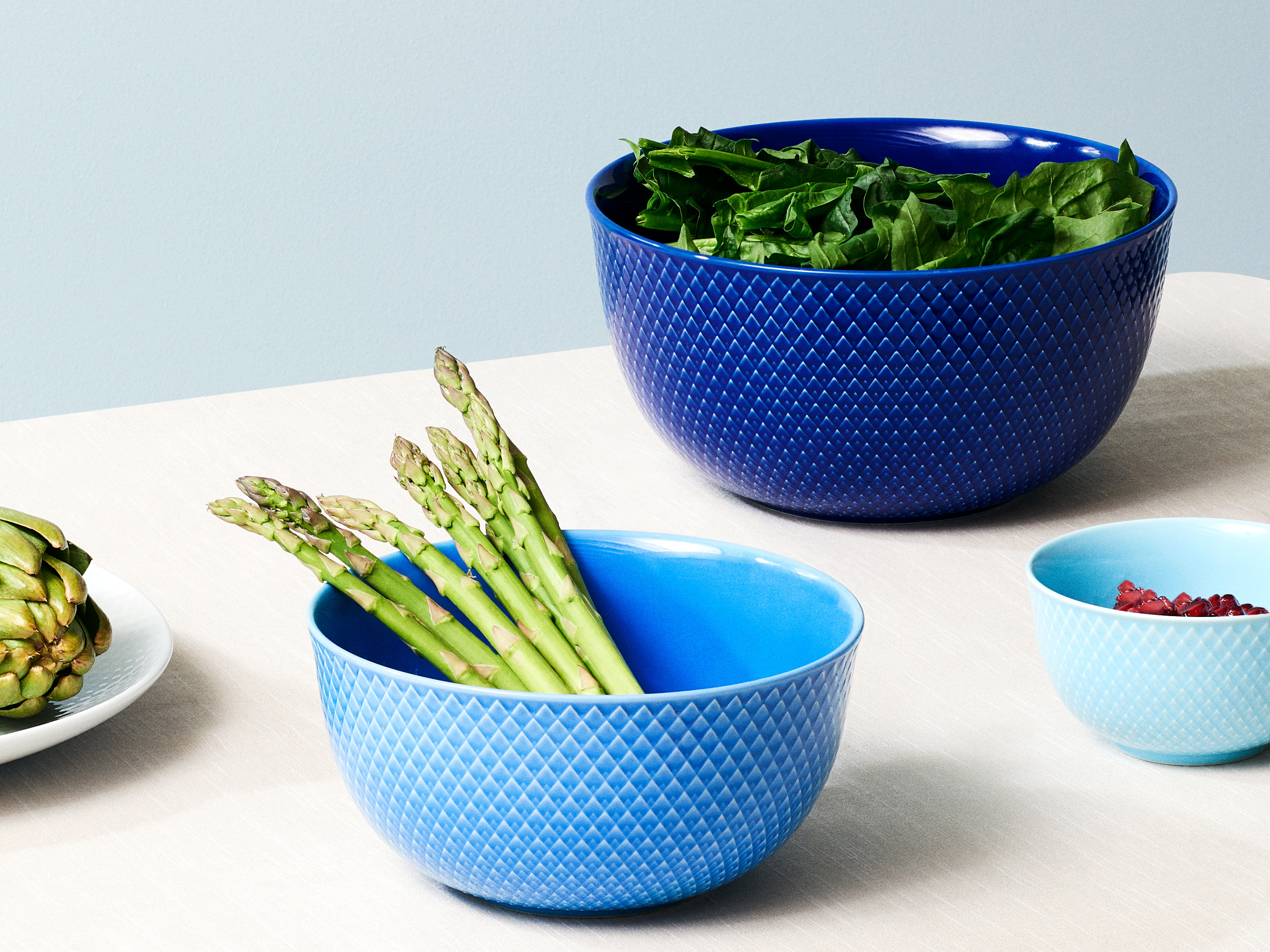 Serving bowls in Rhombe Color frame from Lyngby Porcelæn. Dark blue, light blue and turquoise Rhombe Color bowl from Lyngby Porcelæn. Bowls for serving