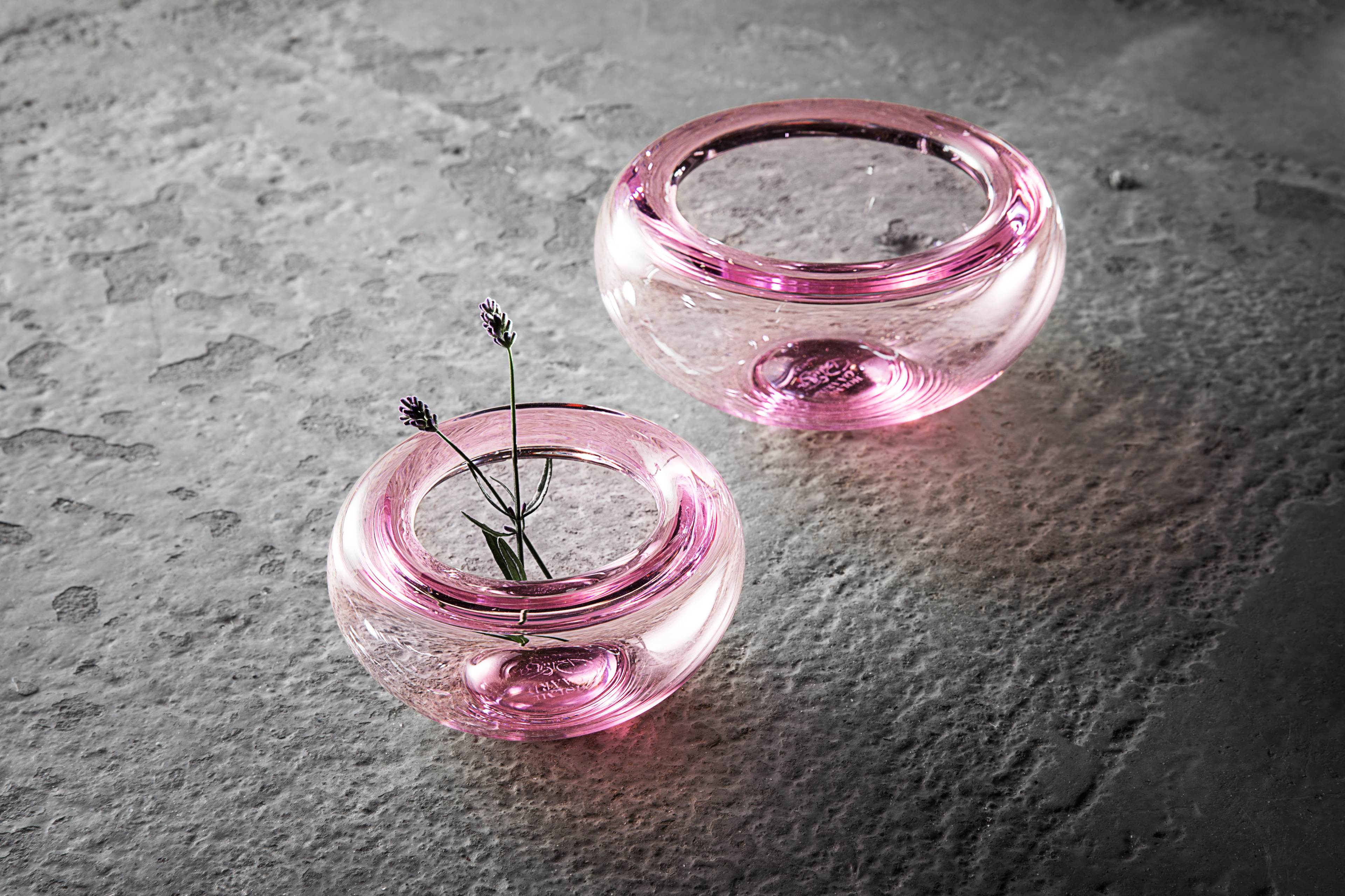 Two pink glass bowls