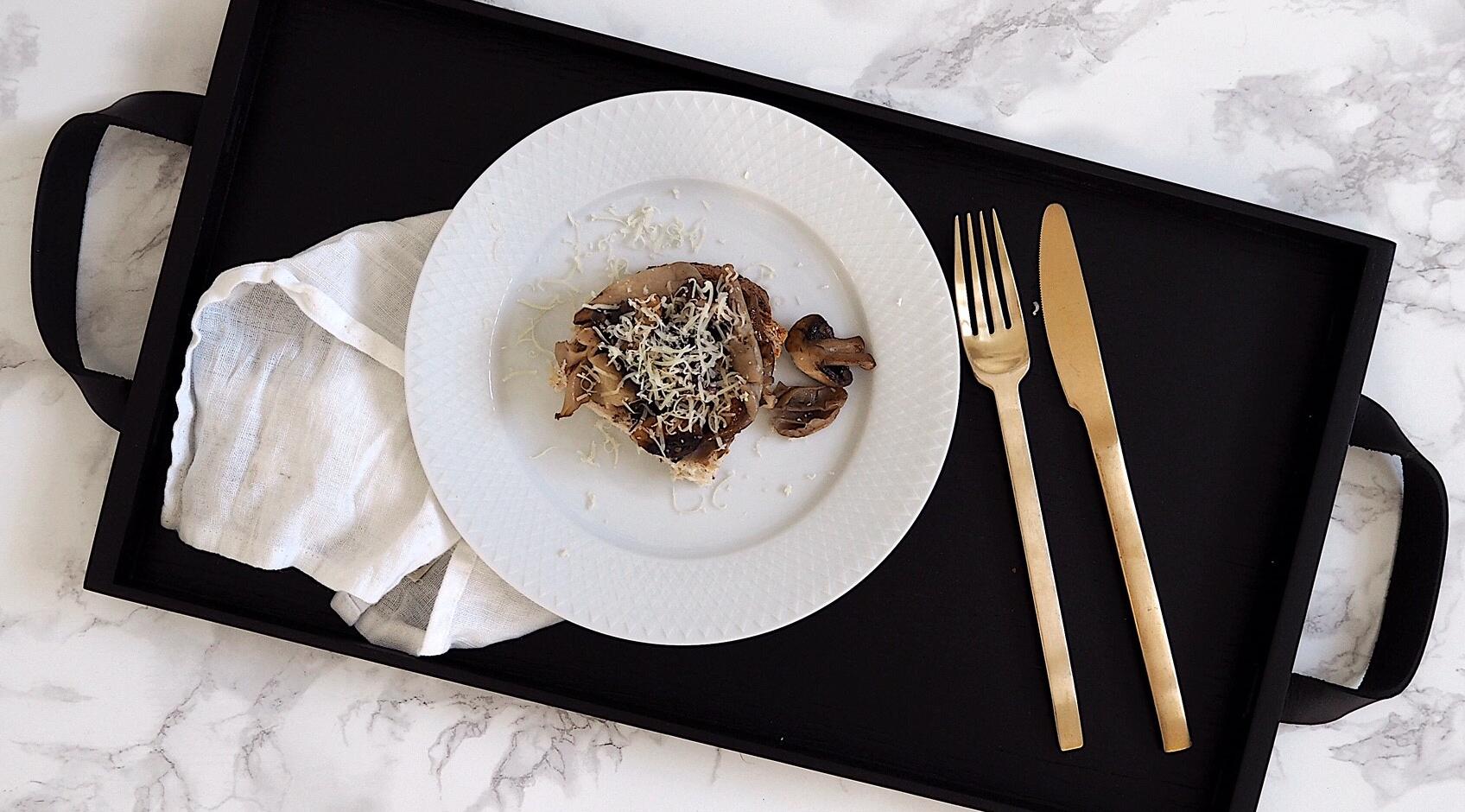 Dinner plate from Lyngby Porcelæn on white marble table and gold cutlery