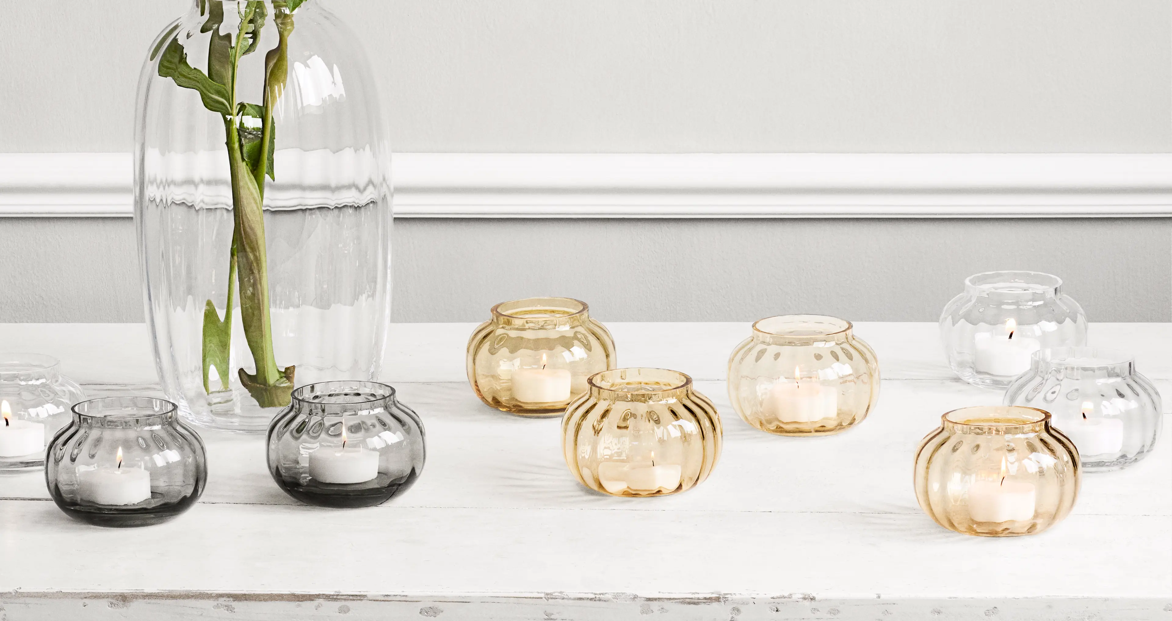 Holmegaard vase and tealight holder.