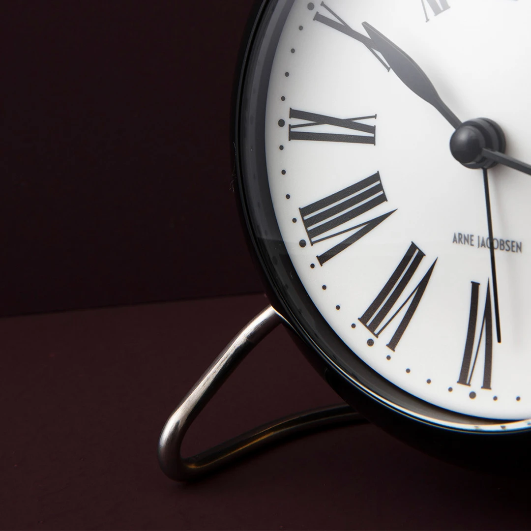 Table clock Ø11 cm from Arne Jacobsen in White/Black color, made of Plastic