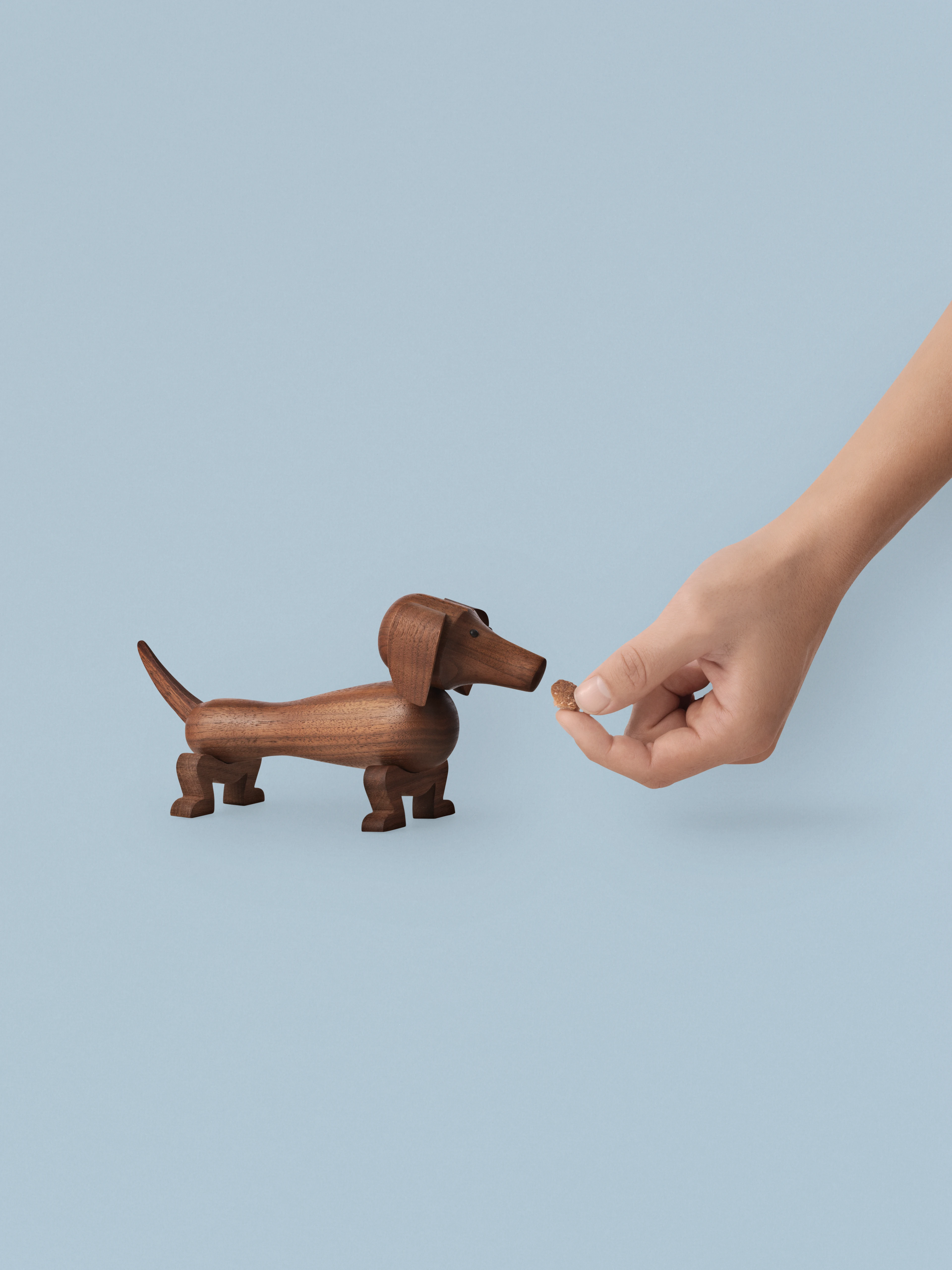 Dog small from Kay Bojesen in Walnut color, made of Wood