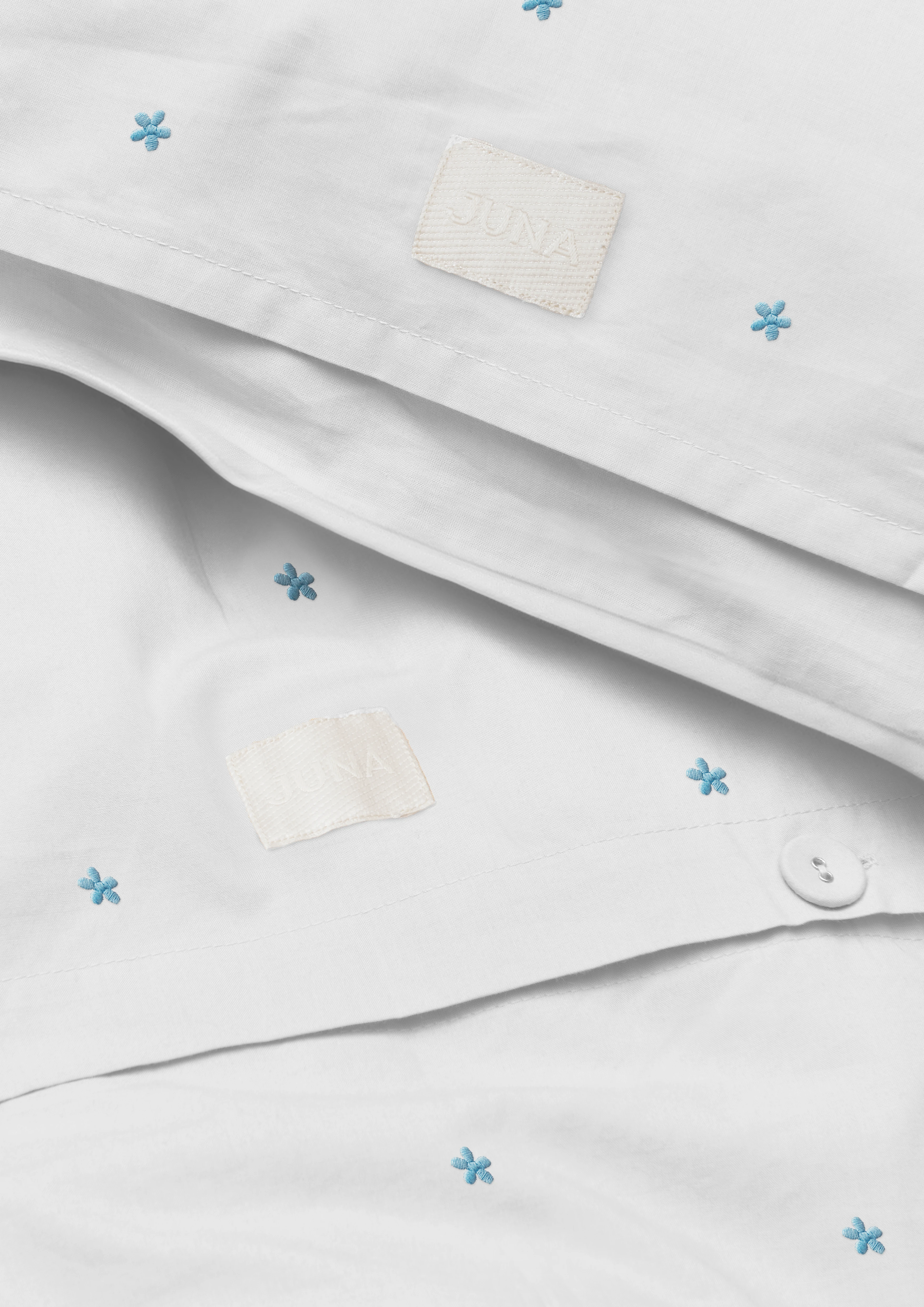 Bed linen 140x200 cm from JUNA in White/Light blue color, made of Cotton