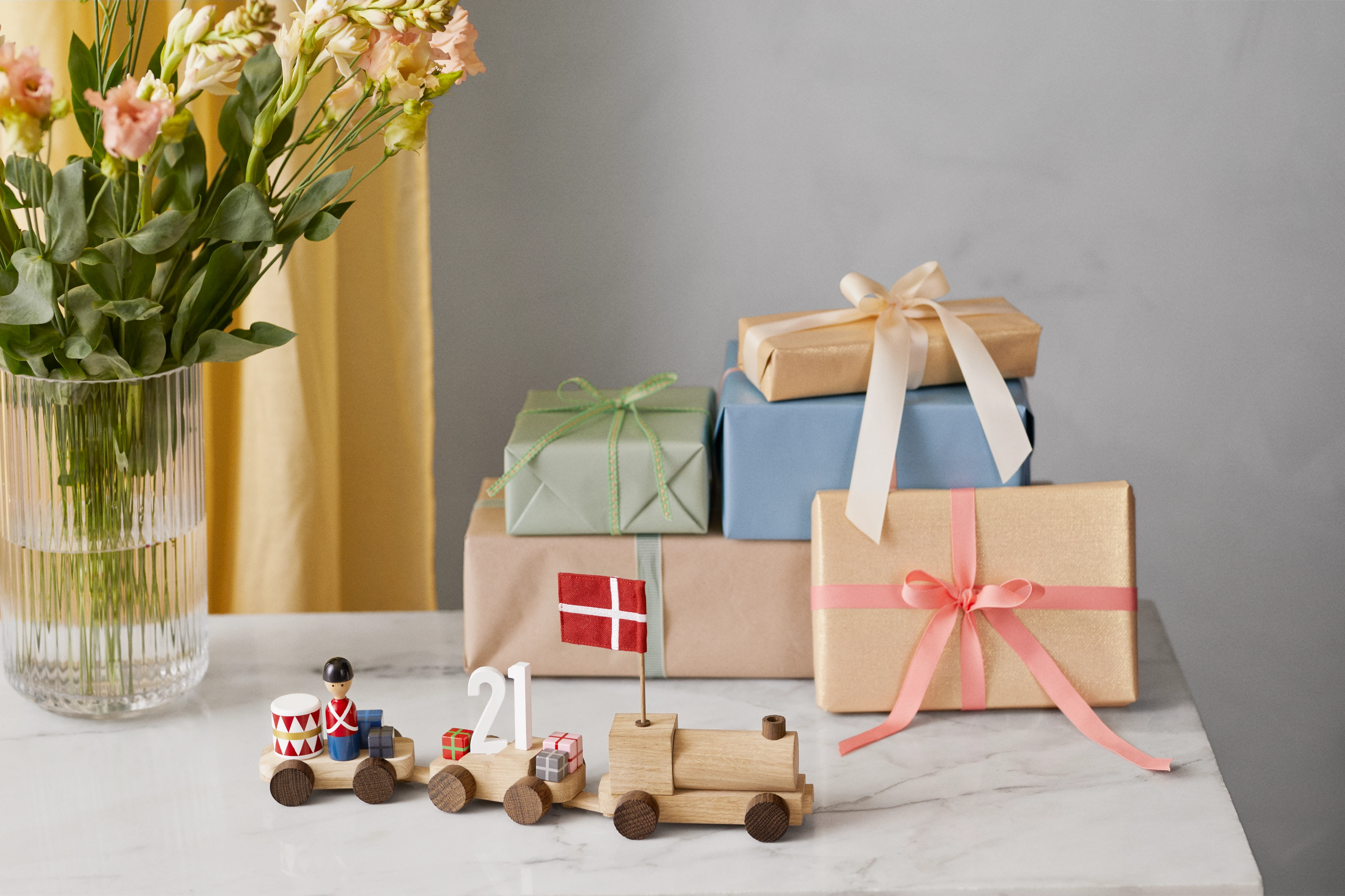 Birthday train Danish from Kay Bojesen in Oak/Smoked oak color, made of Wood