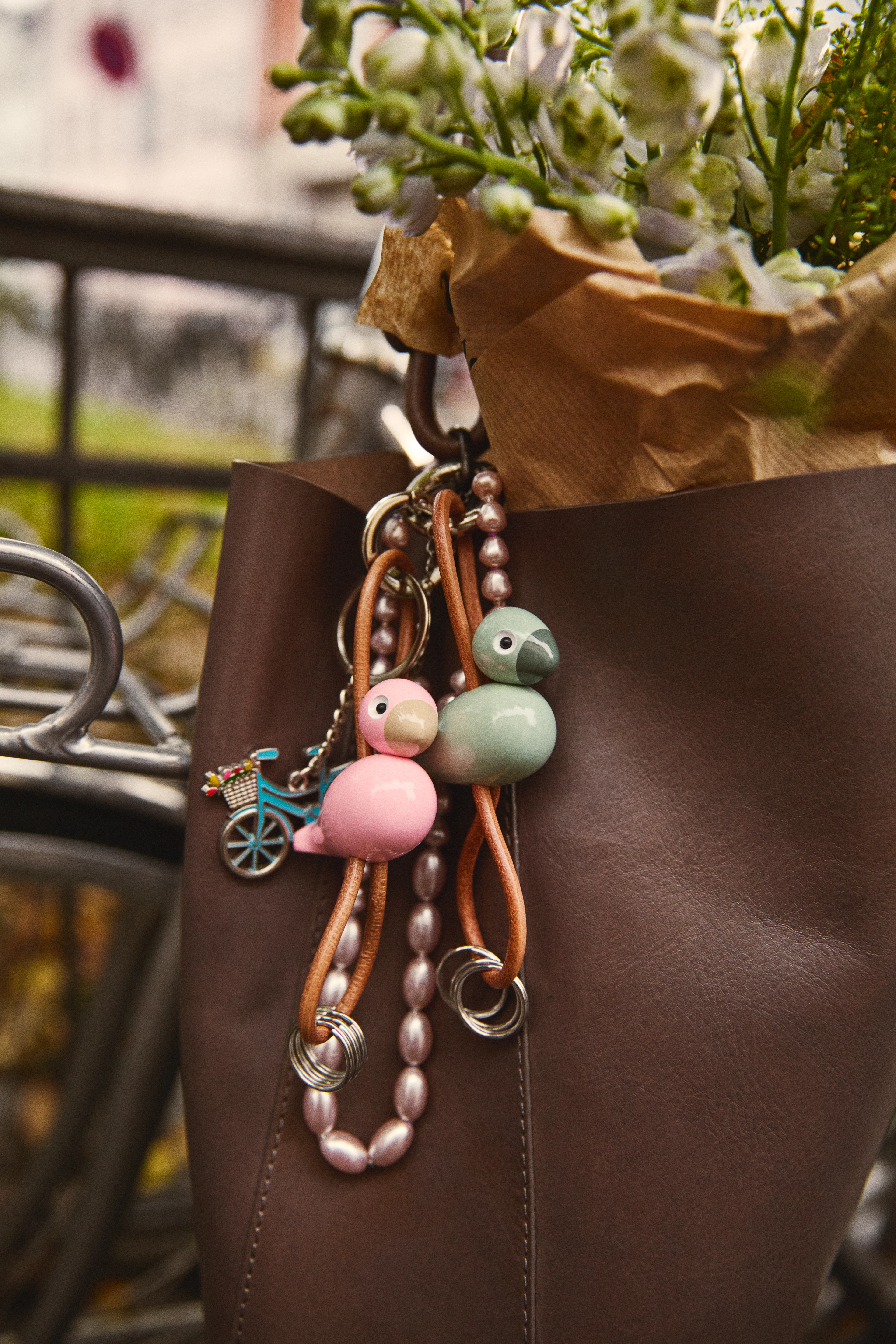 Bird silver metal Keychain with Natural Leather from Kay Bojesen in Rose color, made of Wood