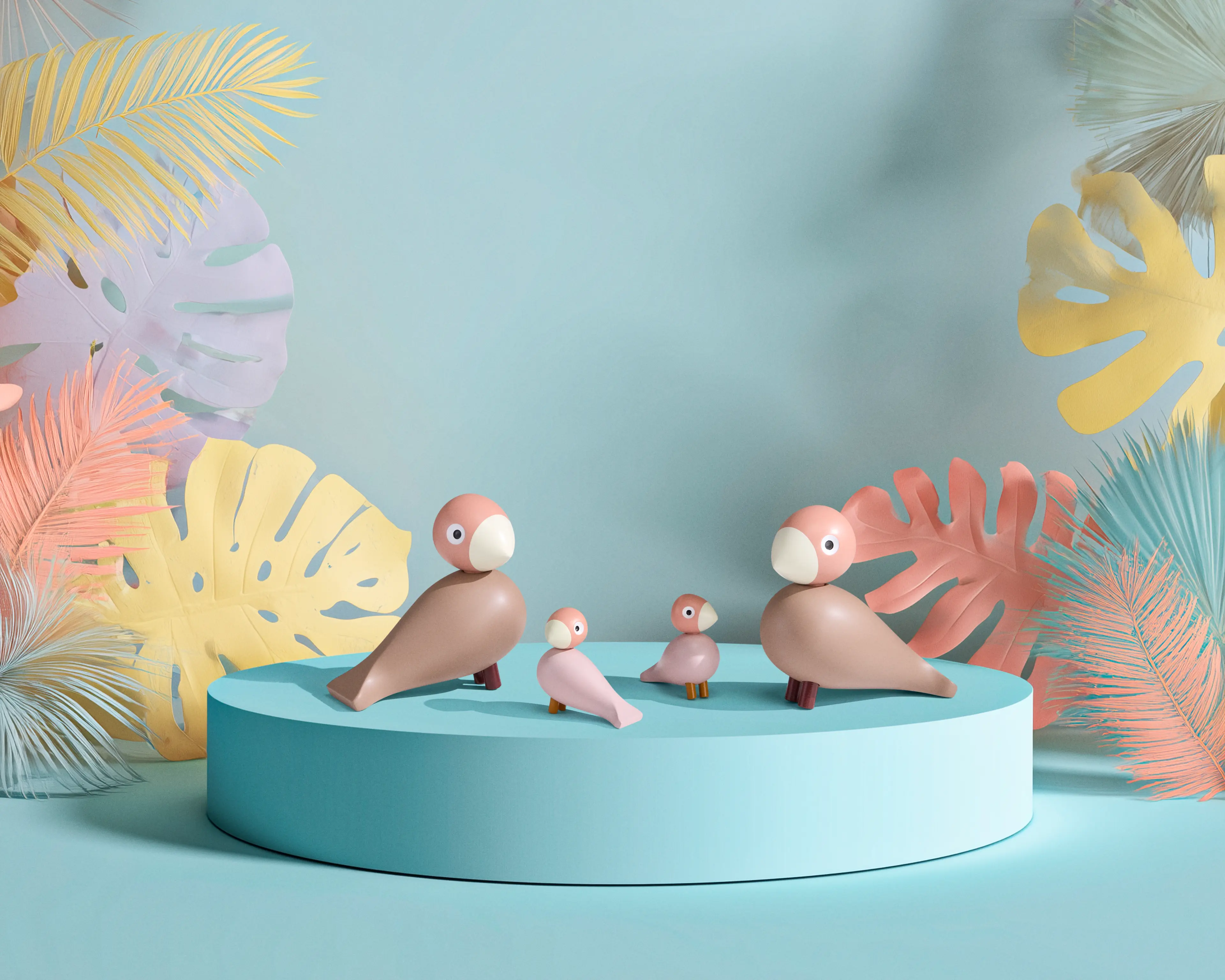 Kay Bojesen Liv & Lykke Soft pink Vogelfiguren auf einem Podest in farbenfrohem Ambiente
