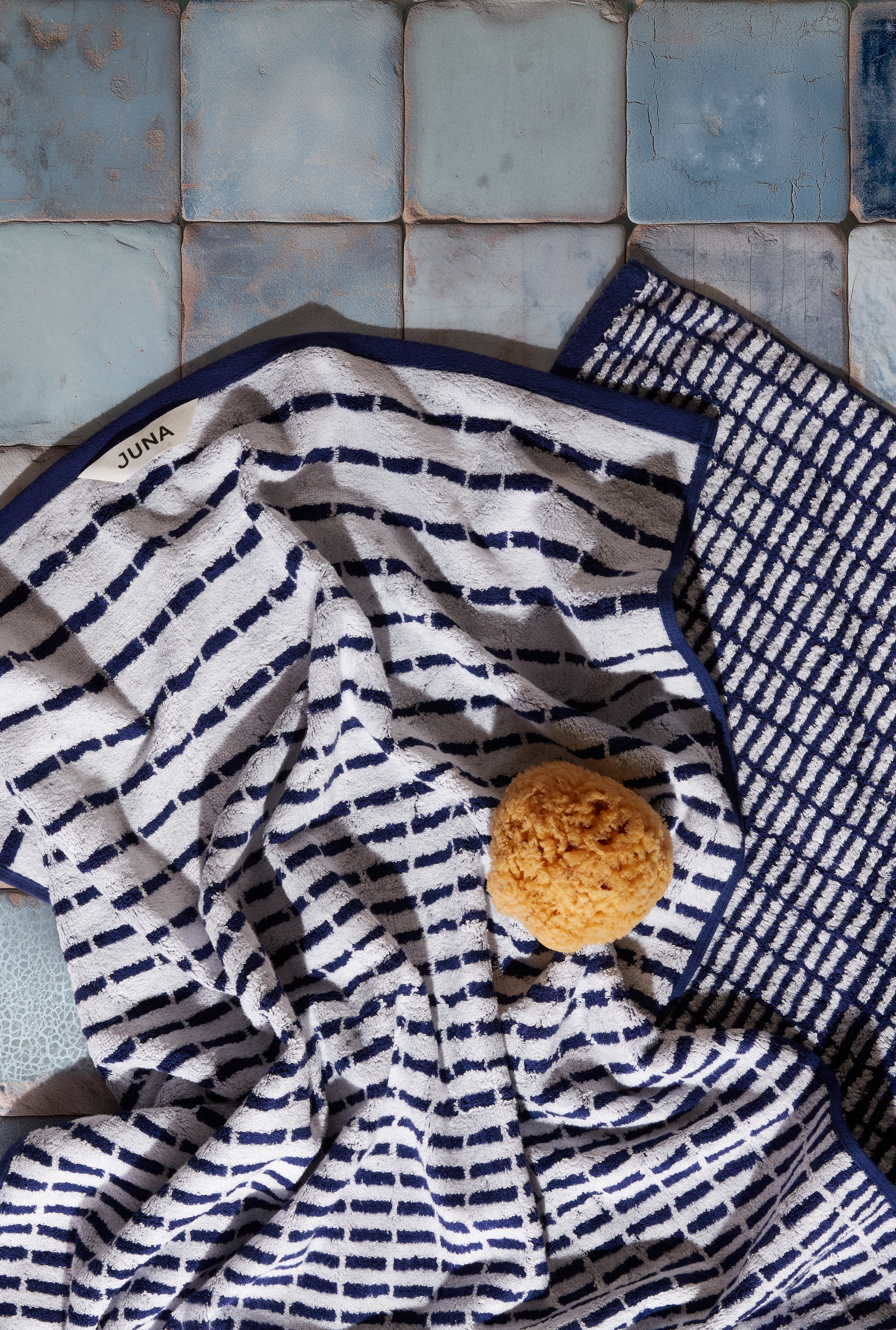 Towel 50x100 cm from JUNA in Dark blue/White color, made of Cotton blend