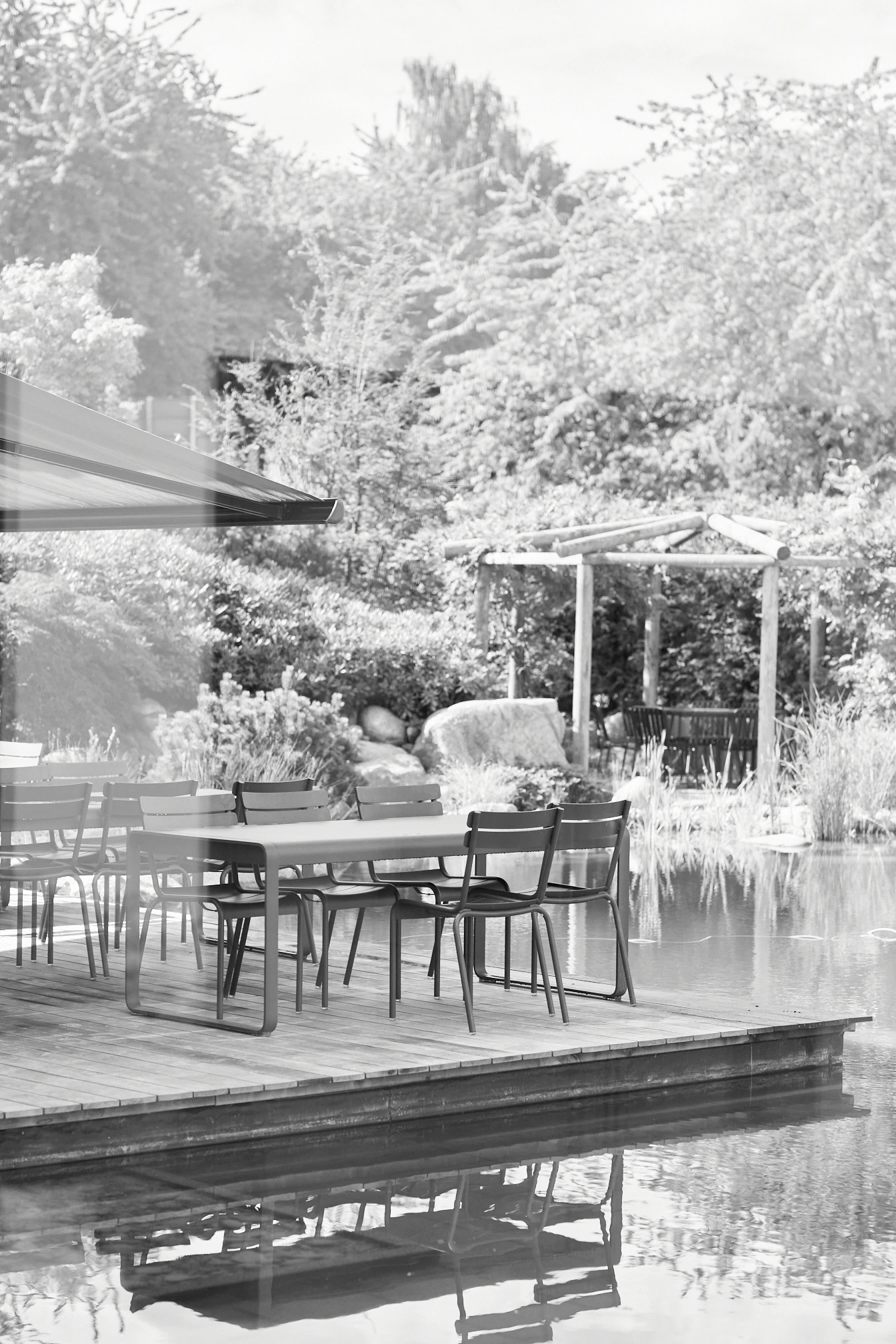 Two young women walking down the stairs in the Rosendahl design group building. 