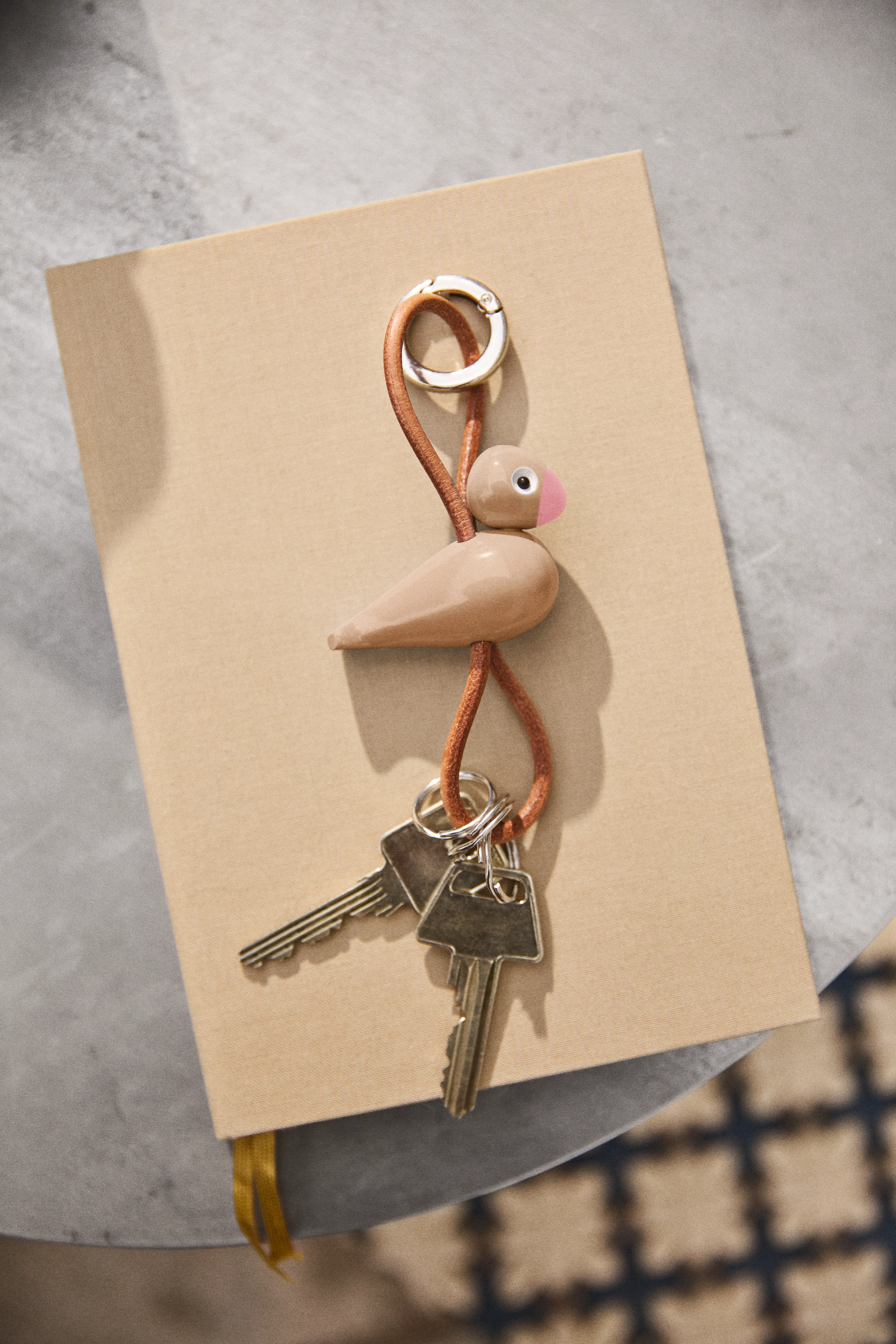 Bird silver metal Keychain with Natural Leather from Kay Bojesen in Mocca color, made of Wood
