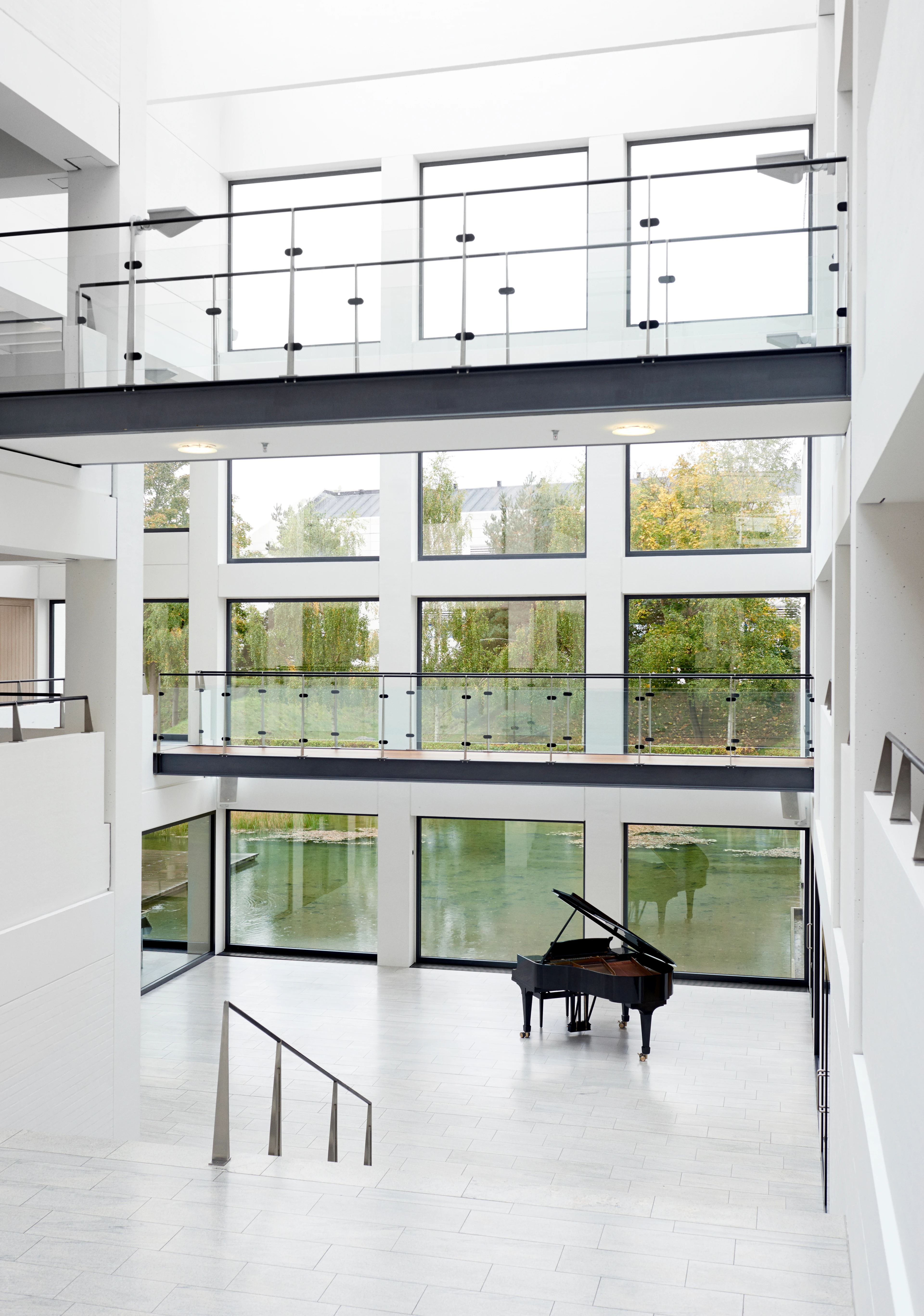 Rosendahl Design Group headquarter with a grand piano and lake view