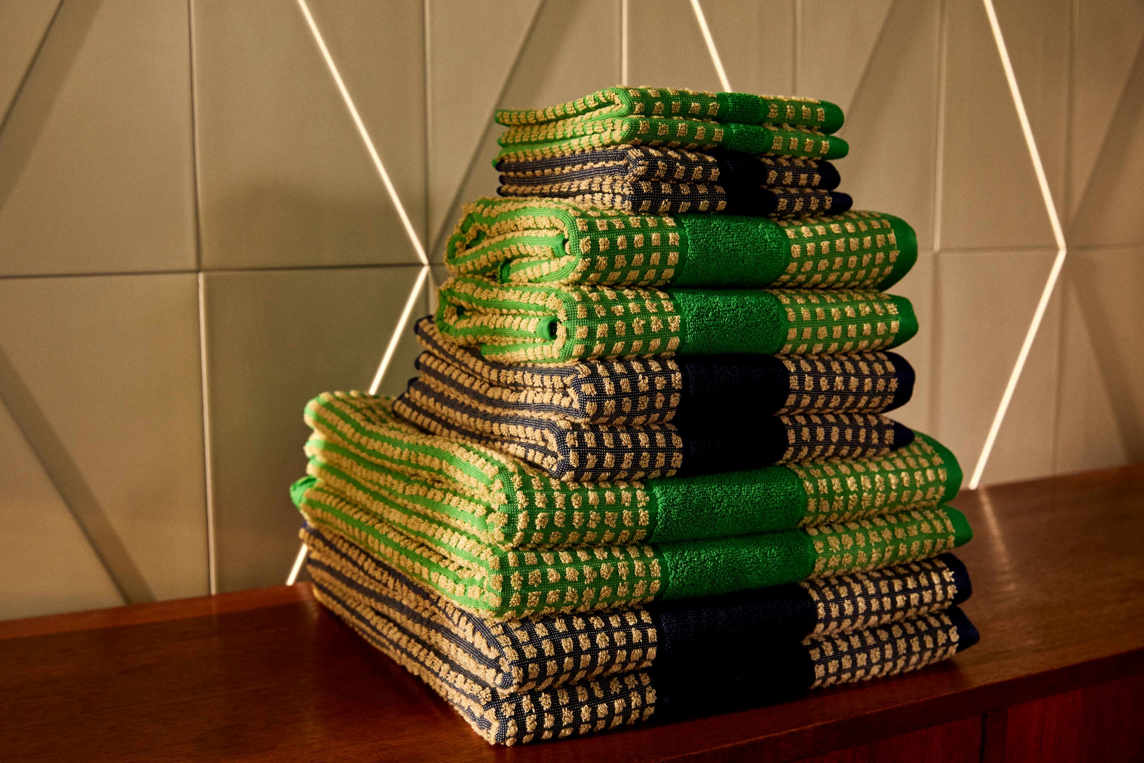 Towel 50x100 cm from JUNA in Green/Sand color, made of Cotton