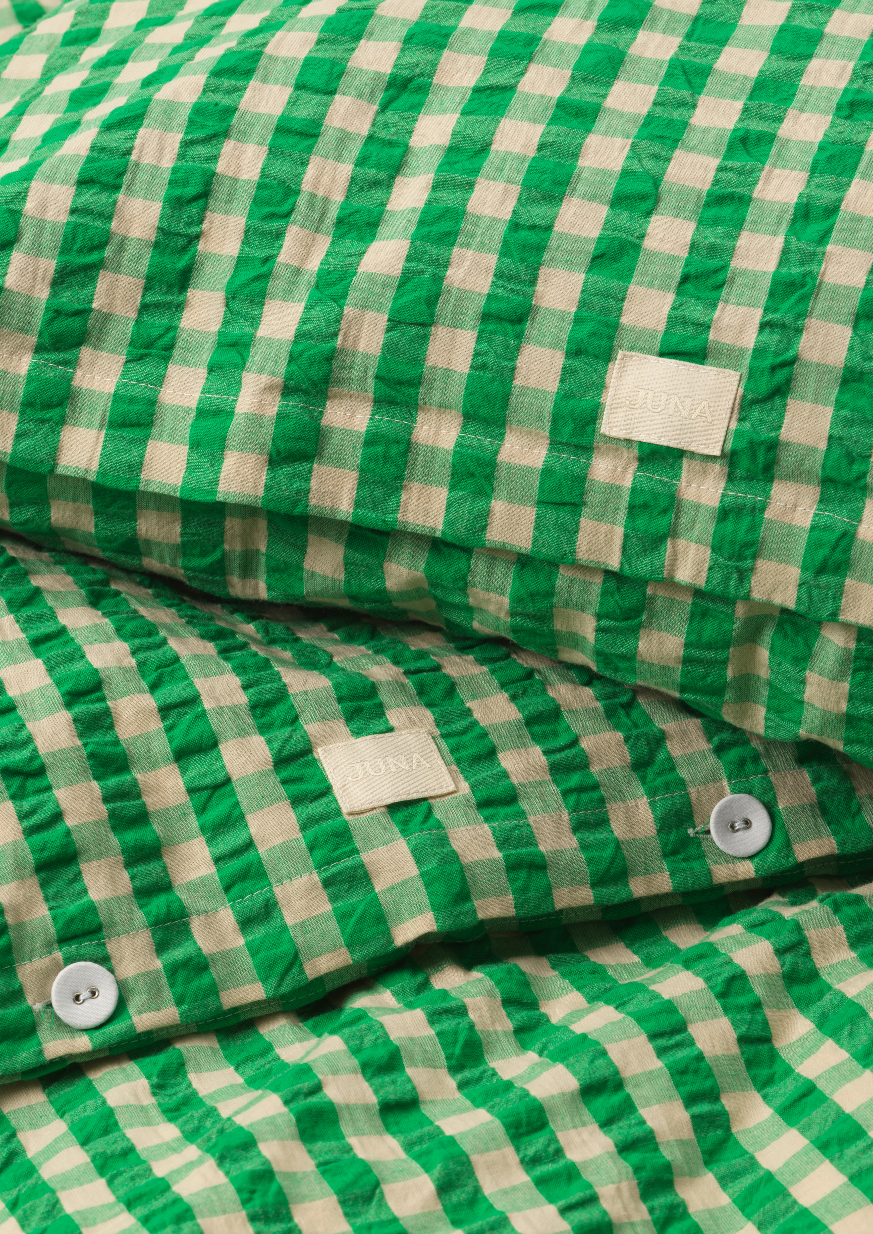 Bed linen 200x220 cm from JUNA in Green/Sand color, made of Cotton