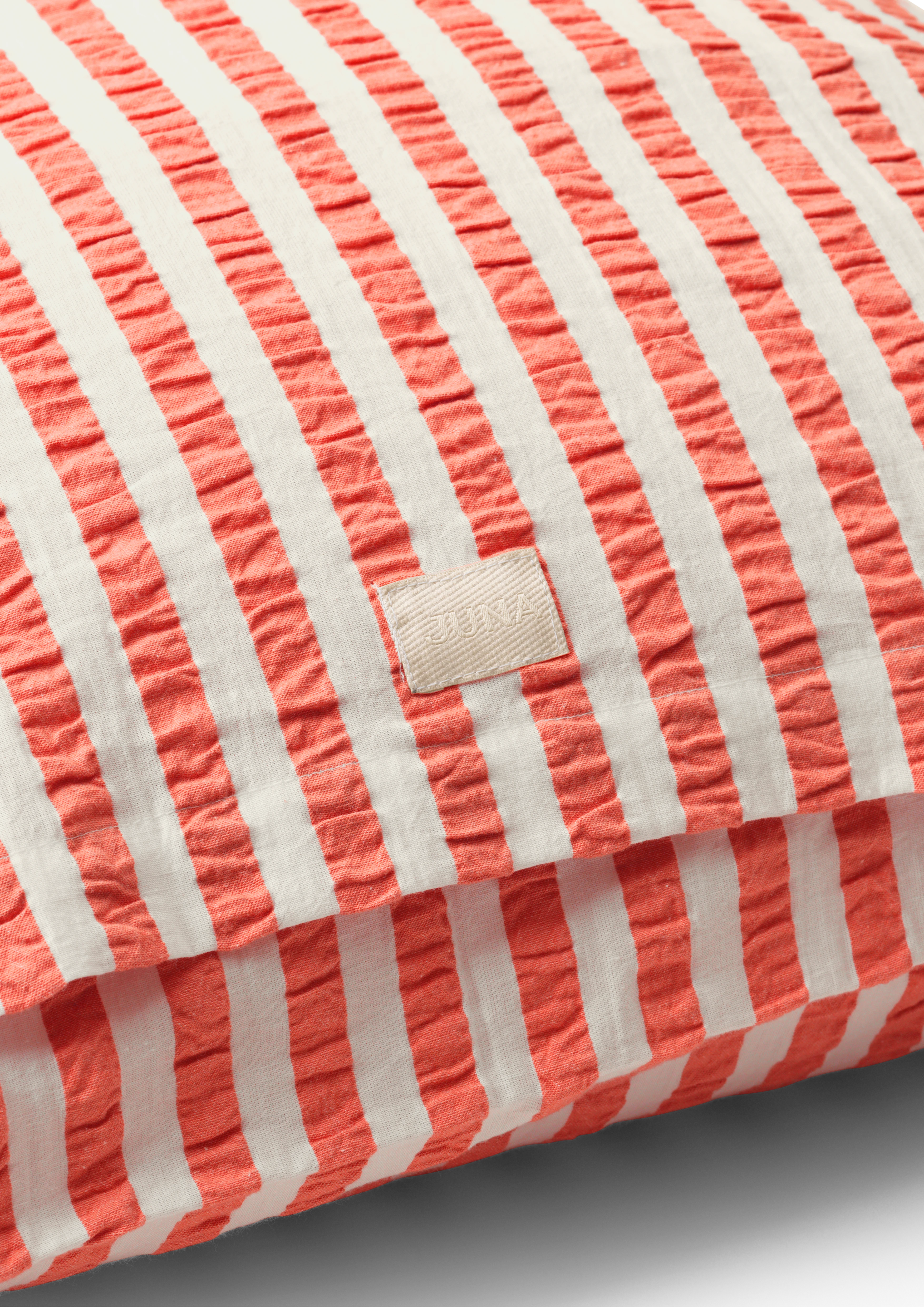 Pillowcase 63x60 cm from JUNA in Chili/Birch color, made of Cotton