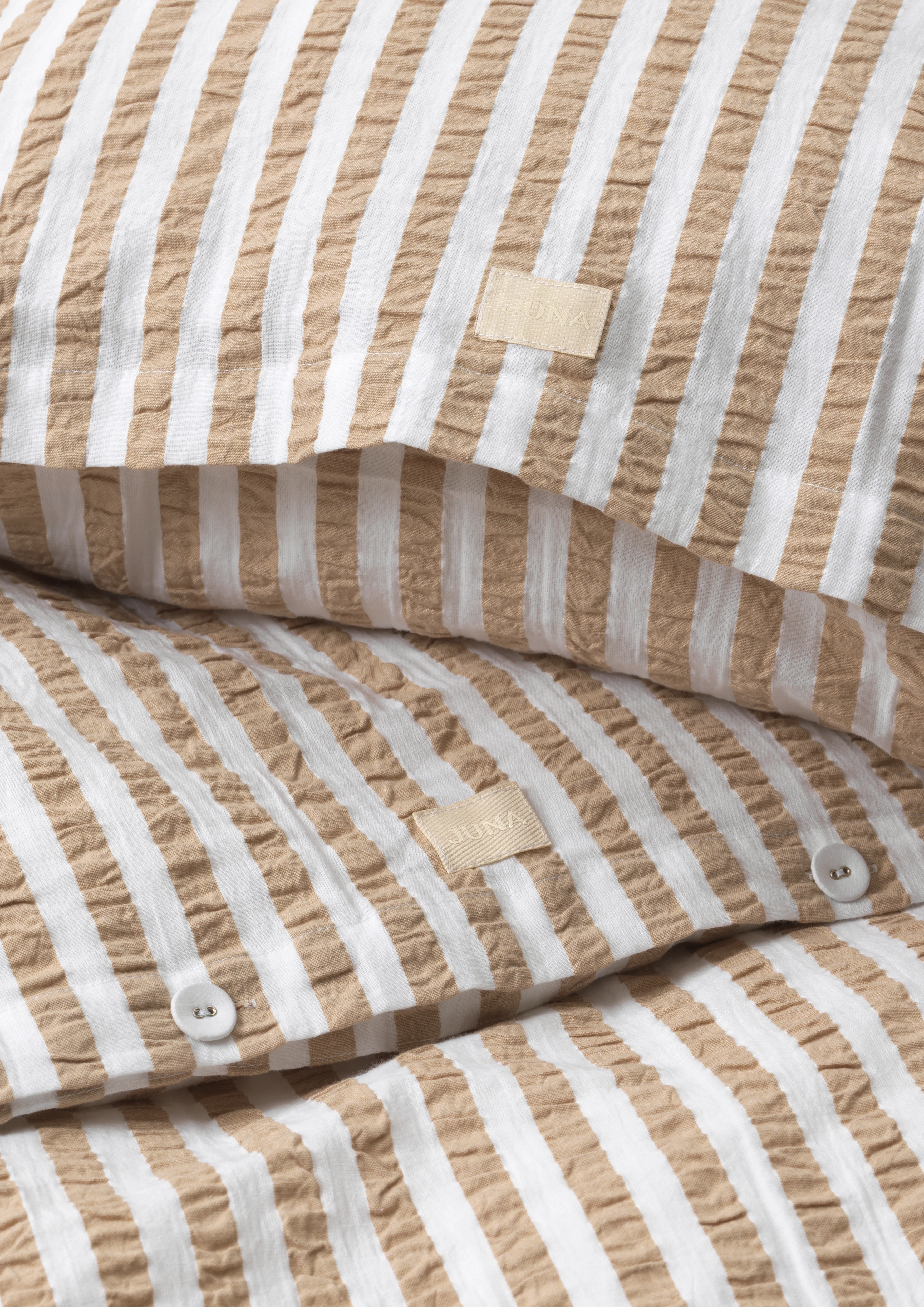 Bed linen 140x220 cm from JUNA in Sand/White color, made of Cotton