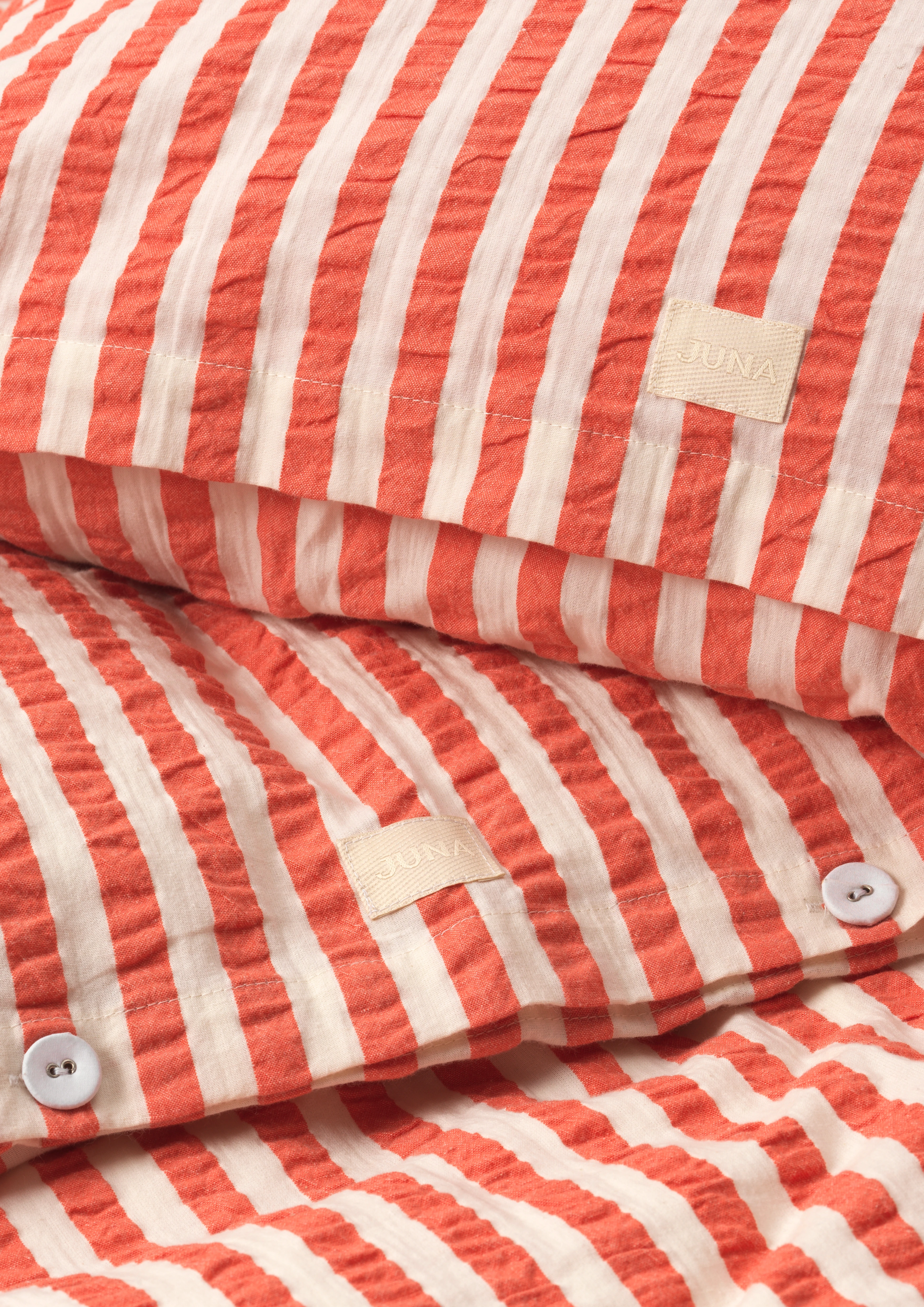 Bed linen 140x200 cm from JUNA in Chili/Birch color, made of Cotton