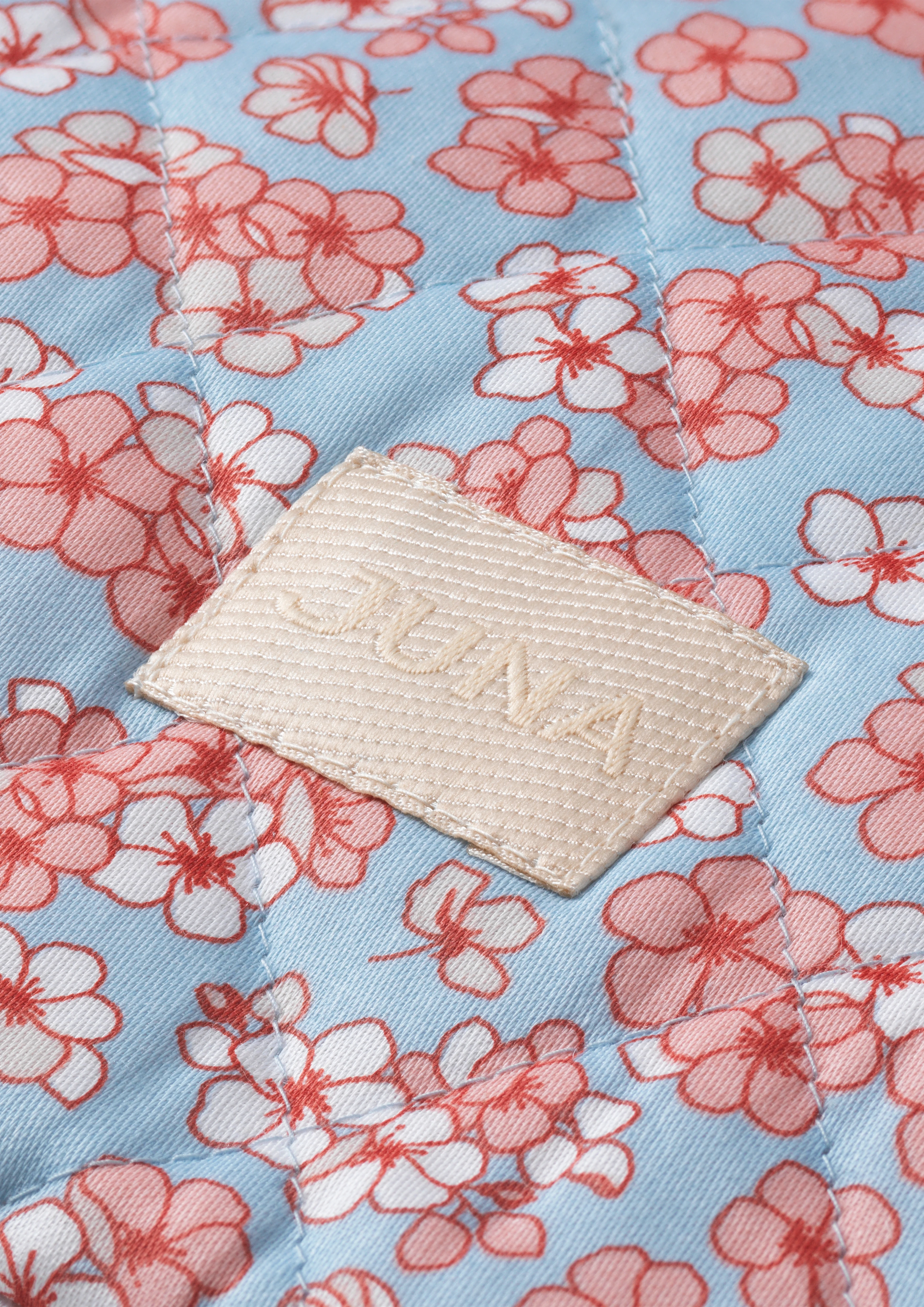 Paula multi-functional sleeve 28x22 cm from JUNA in Light blue/Rose color, made of Cotton