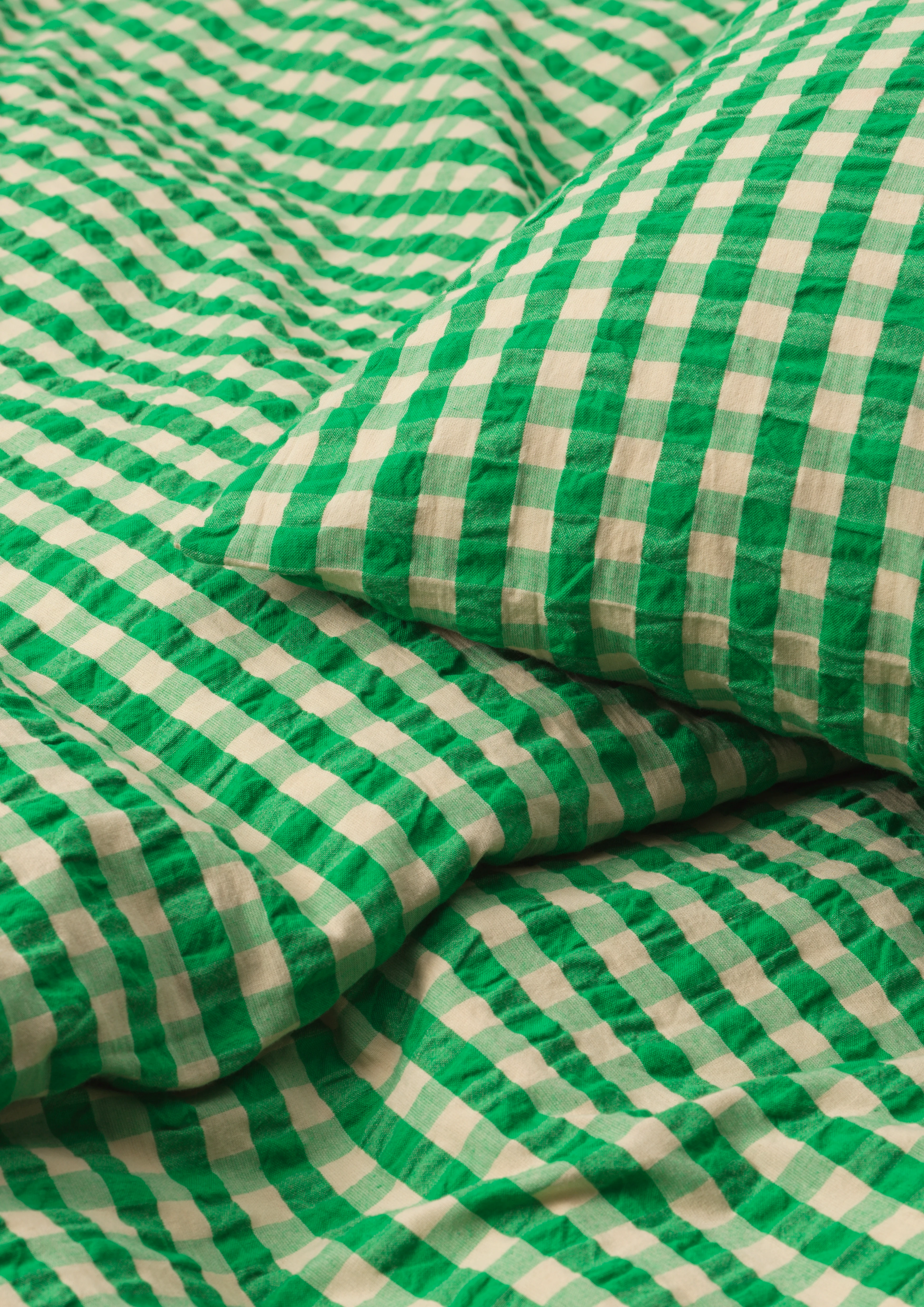 Bed linen 220x220 cm from JUNA in Green/Sand color, made of Cotton