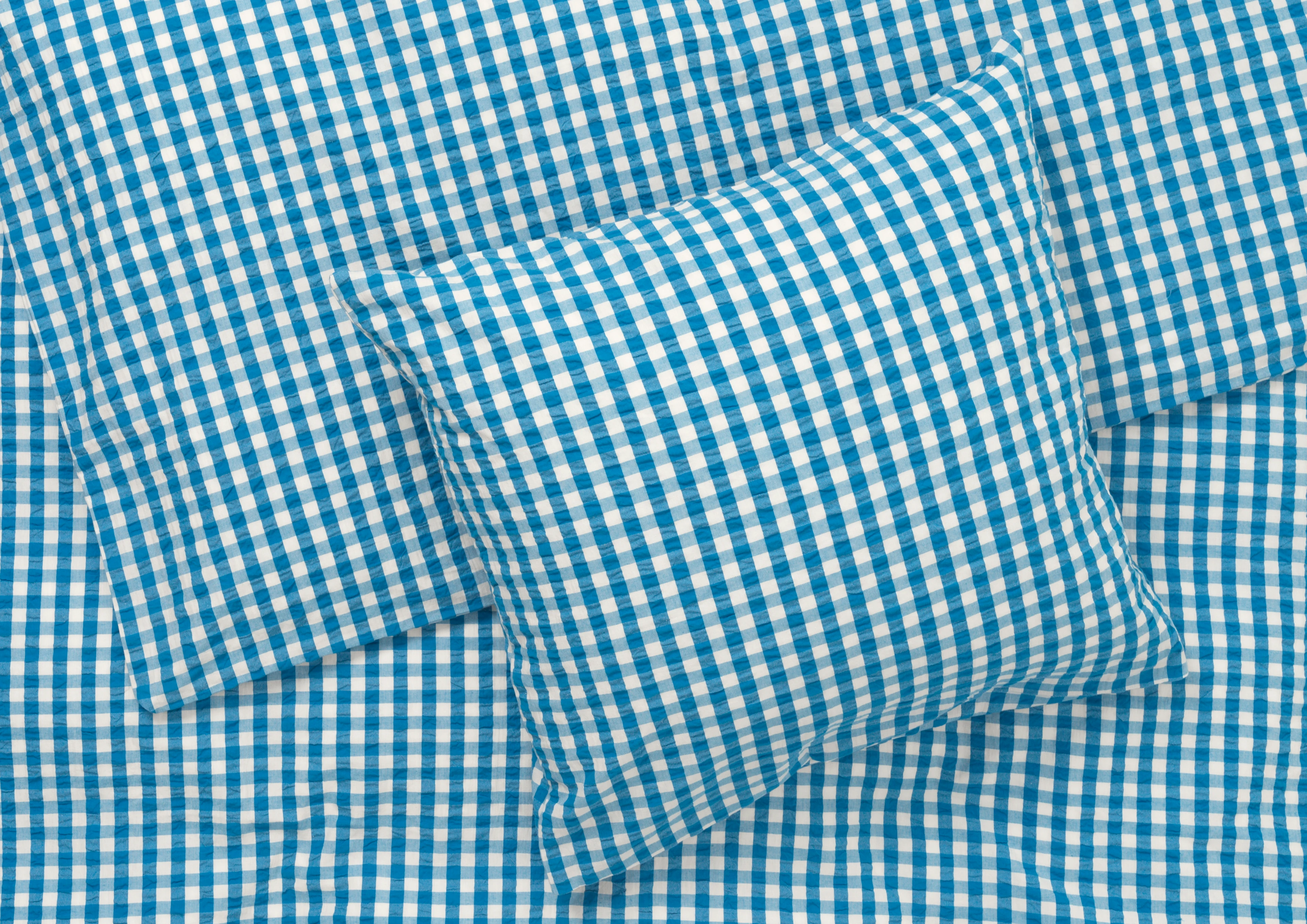 Bed linen 220x220 cm from JUNA in Blue/Birch color, made of Cotton