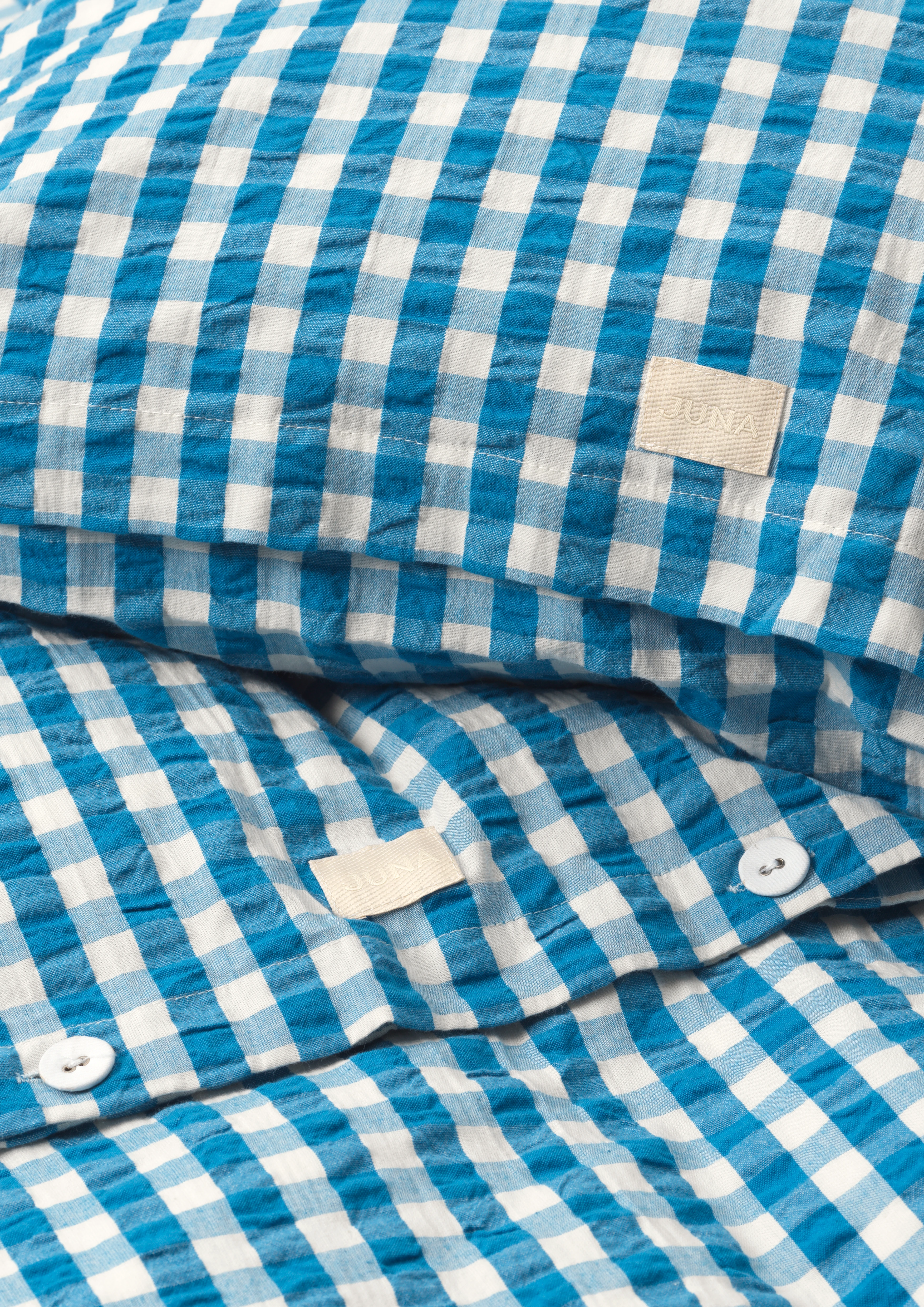 Bed linen 220x220 cm from JUNA in Blue/Birch color, made of Cotton