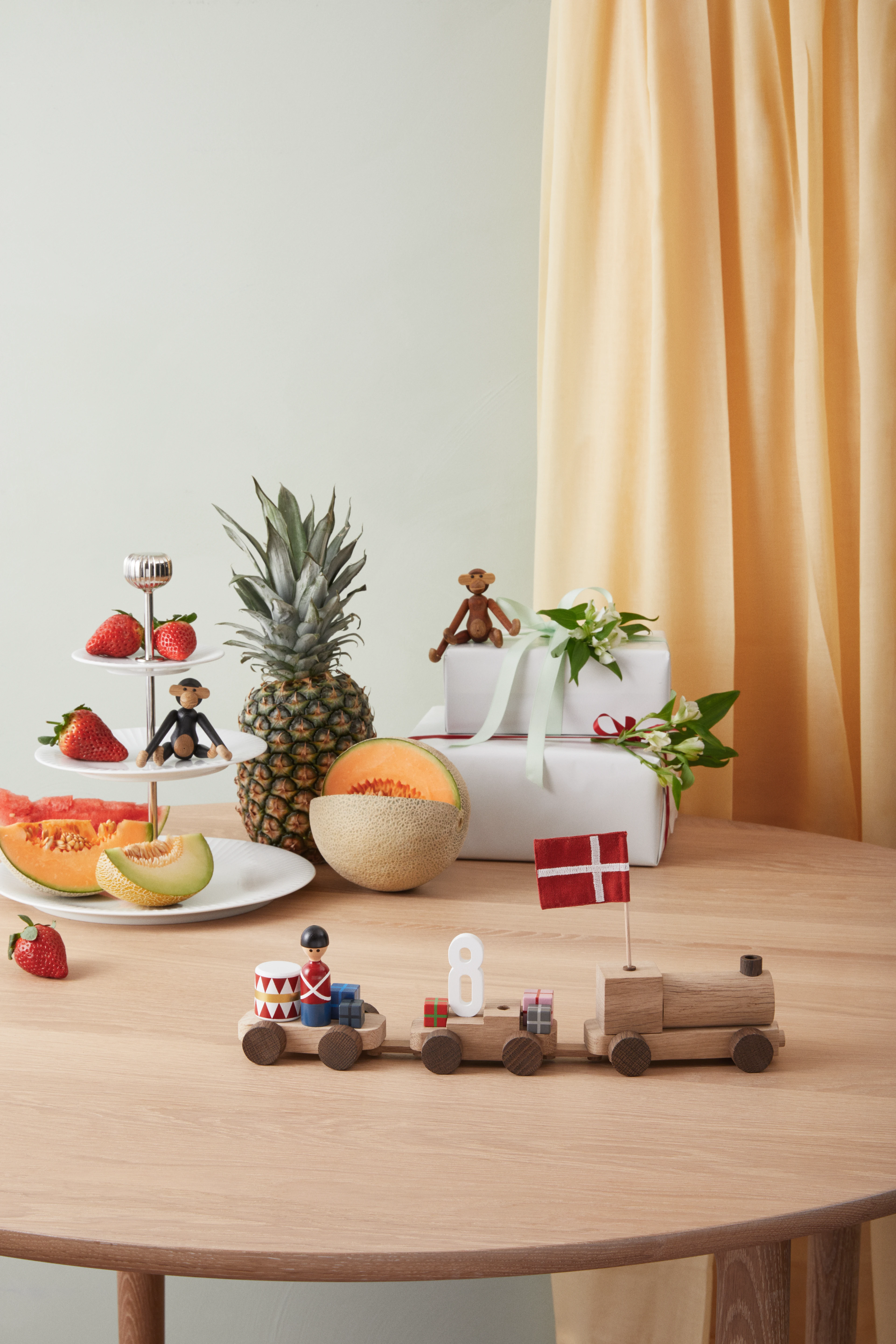 Birthday train Danish from Kay Bojesen in Oak/Smoked oak color, made of Wood