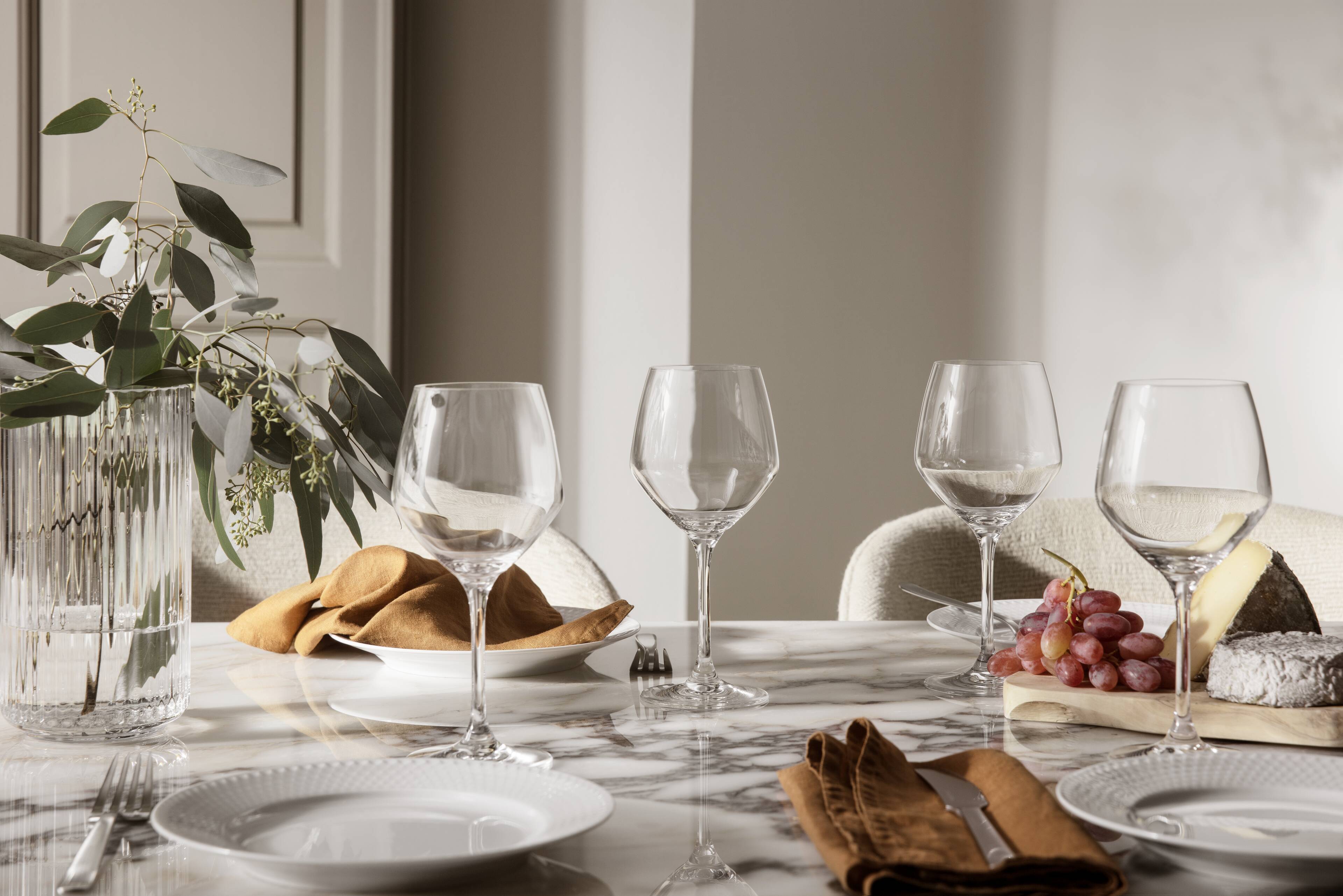 Perfection glass on table with flowers