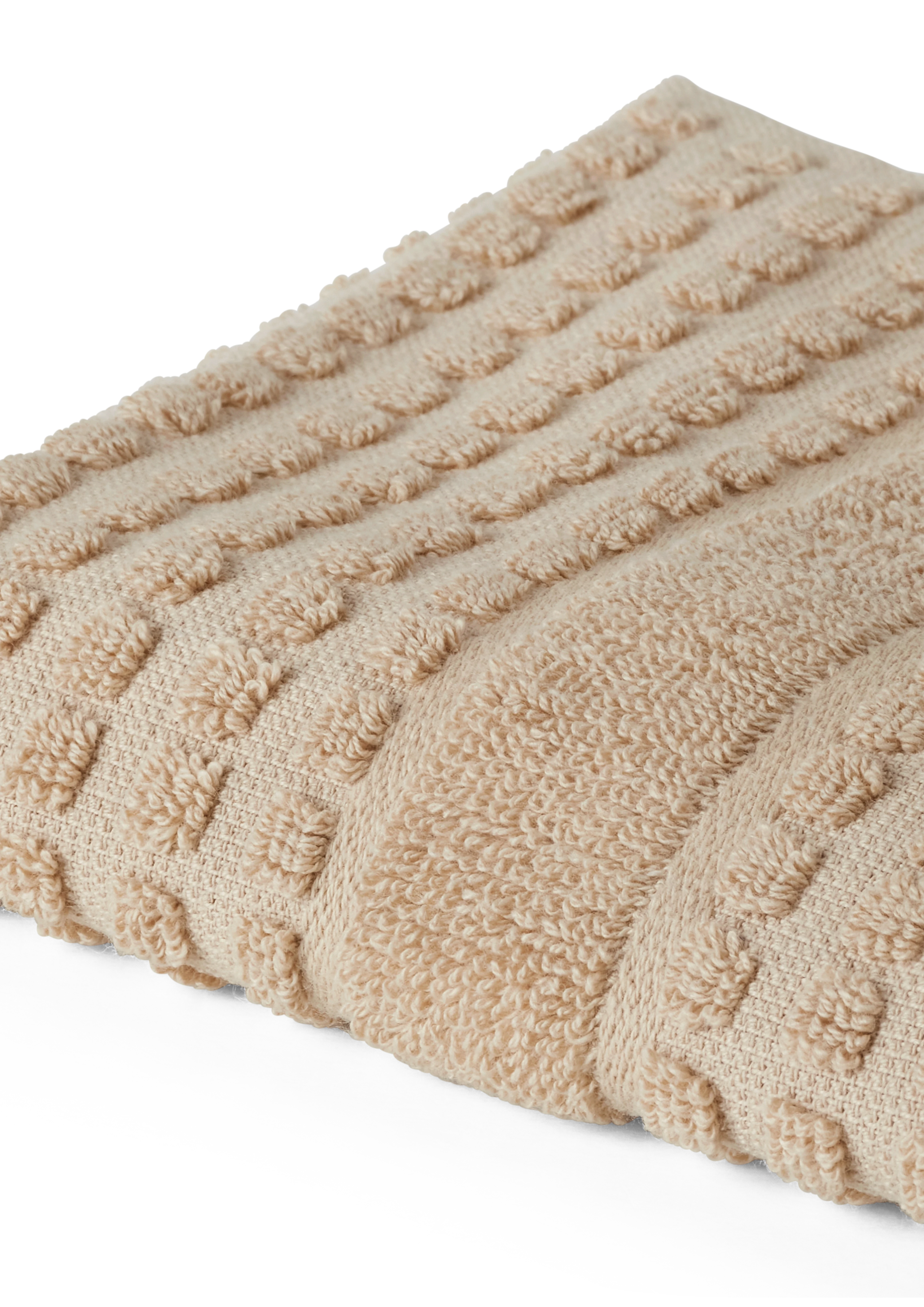 Vaskeklut 30x30 cm fra JUNA i fargen Sand, laget av Bomull