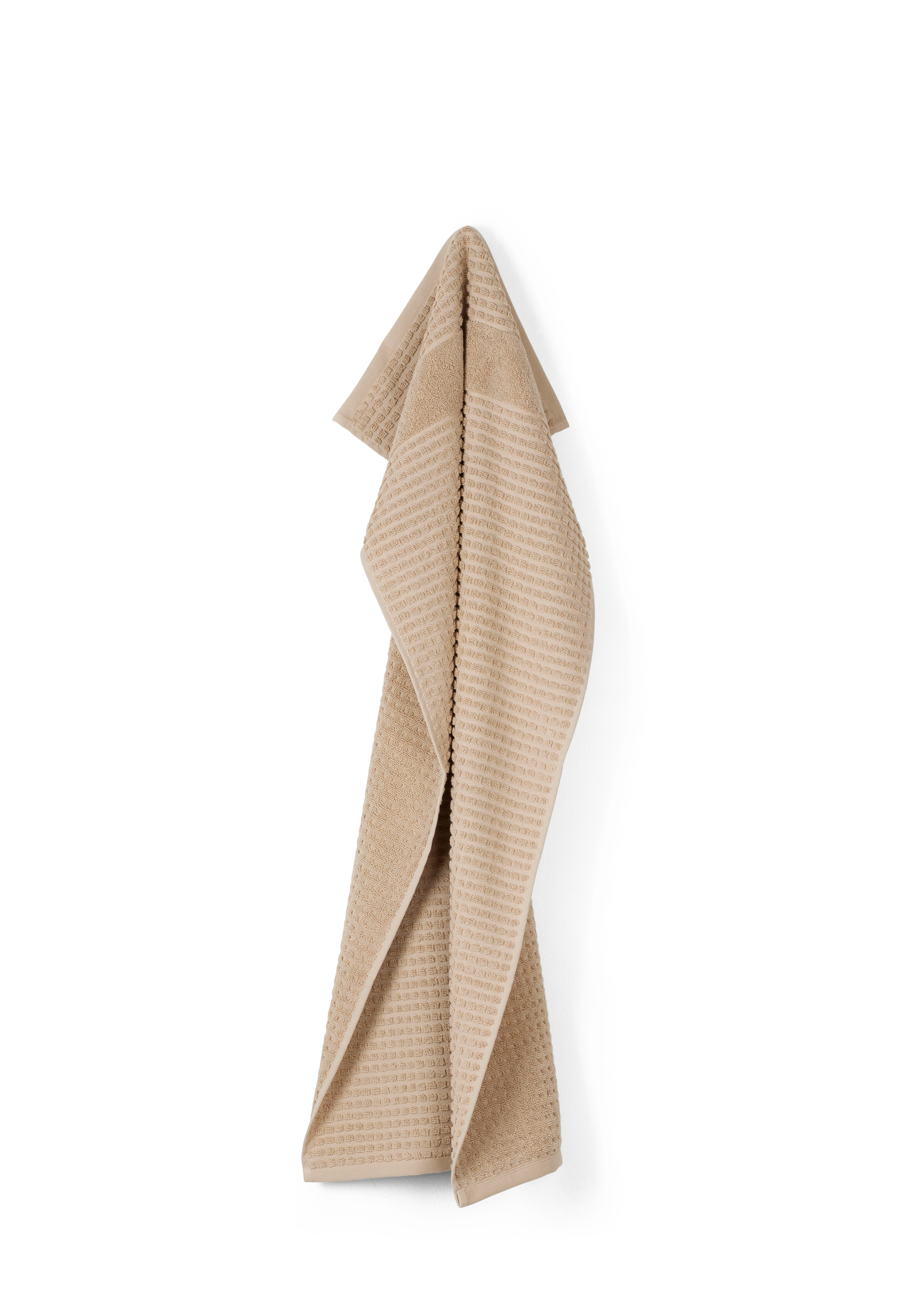 Håndklæde 50x100 cm fra JUNA i farven Sand, lavet af Bomuld