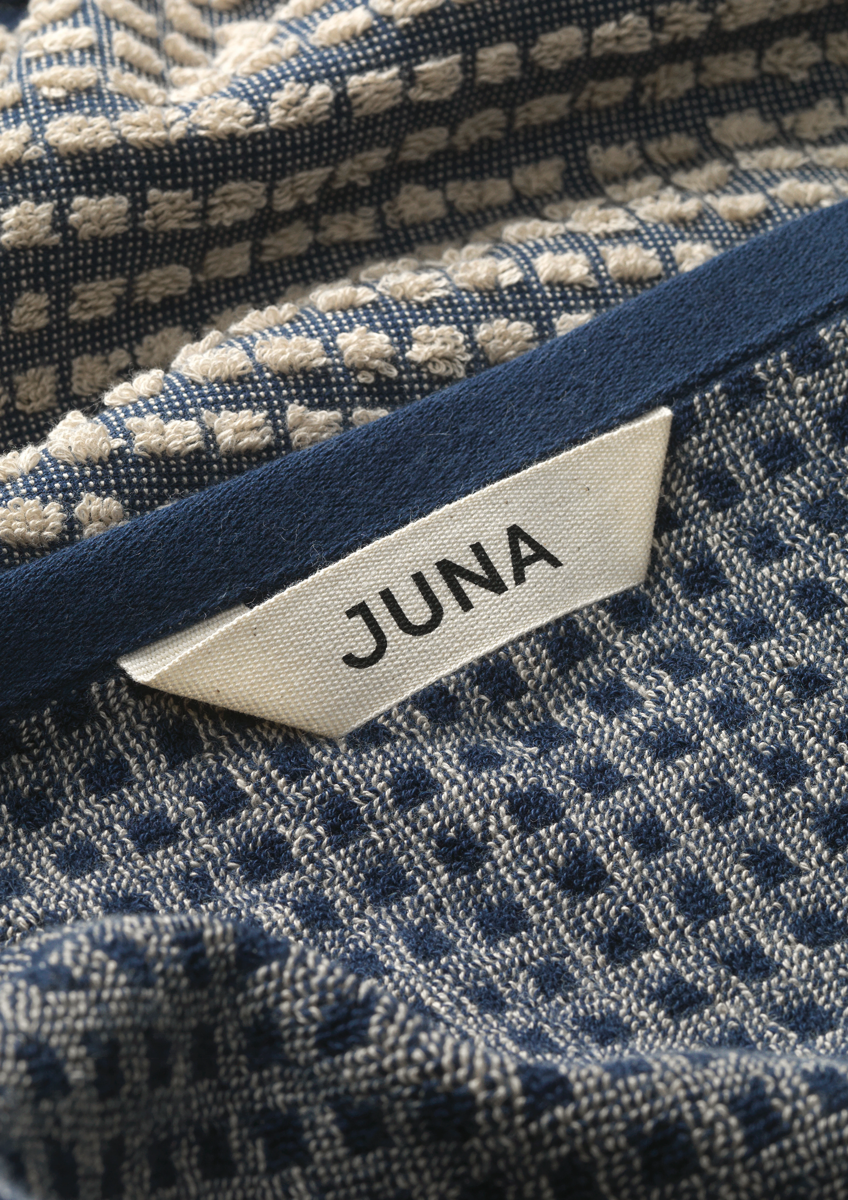 Towel 70x140 cm from JUNA in Dark blue/Sand color, made of Cotton