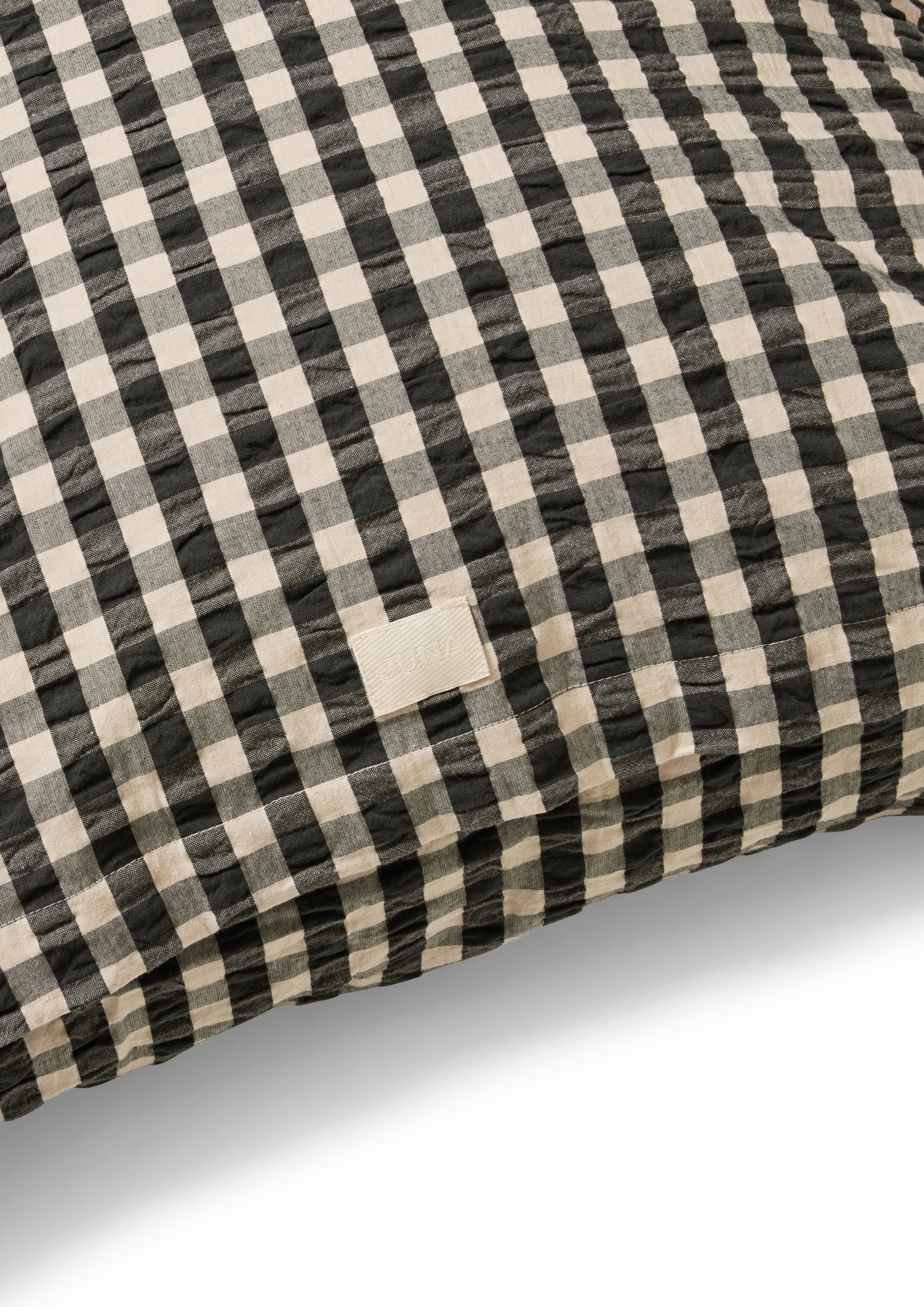 Pillowcase 63x60 cm from JUNA in Black/Sand color, made of Cotton