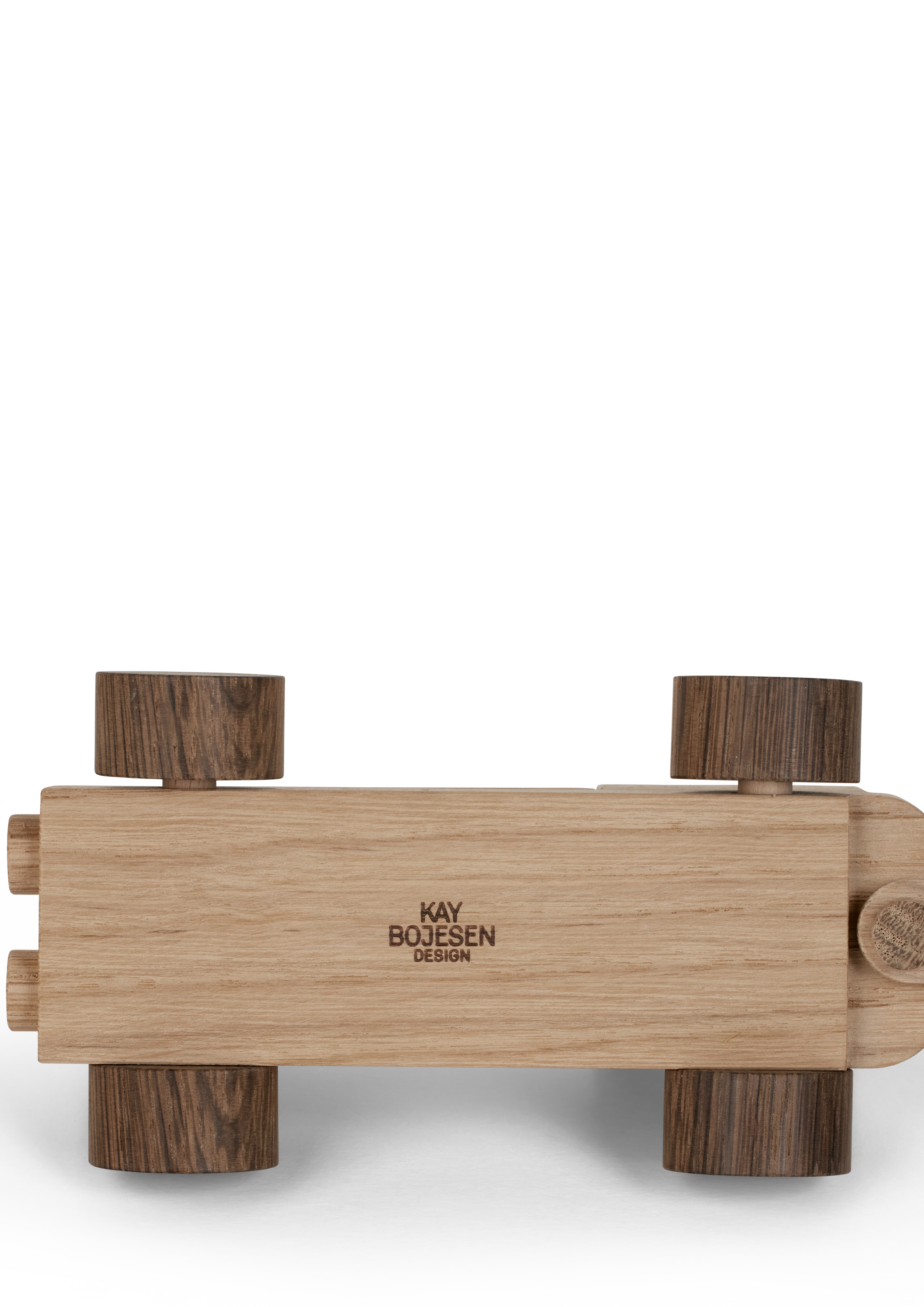 Birthday train Danish from Kay Bojesen in Oak/Smoked oak color, made of Wood