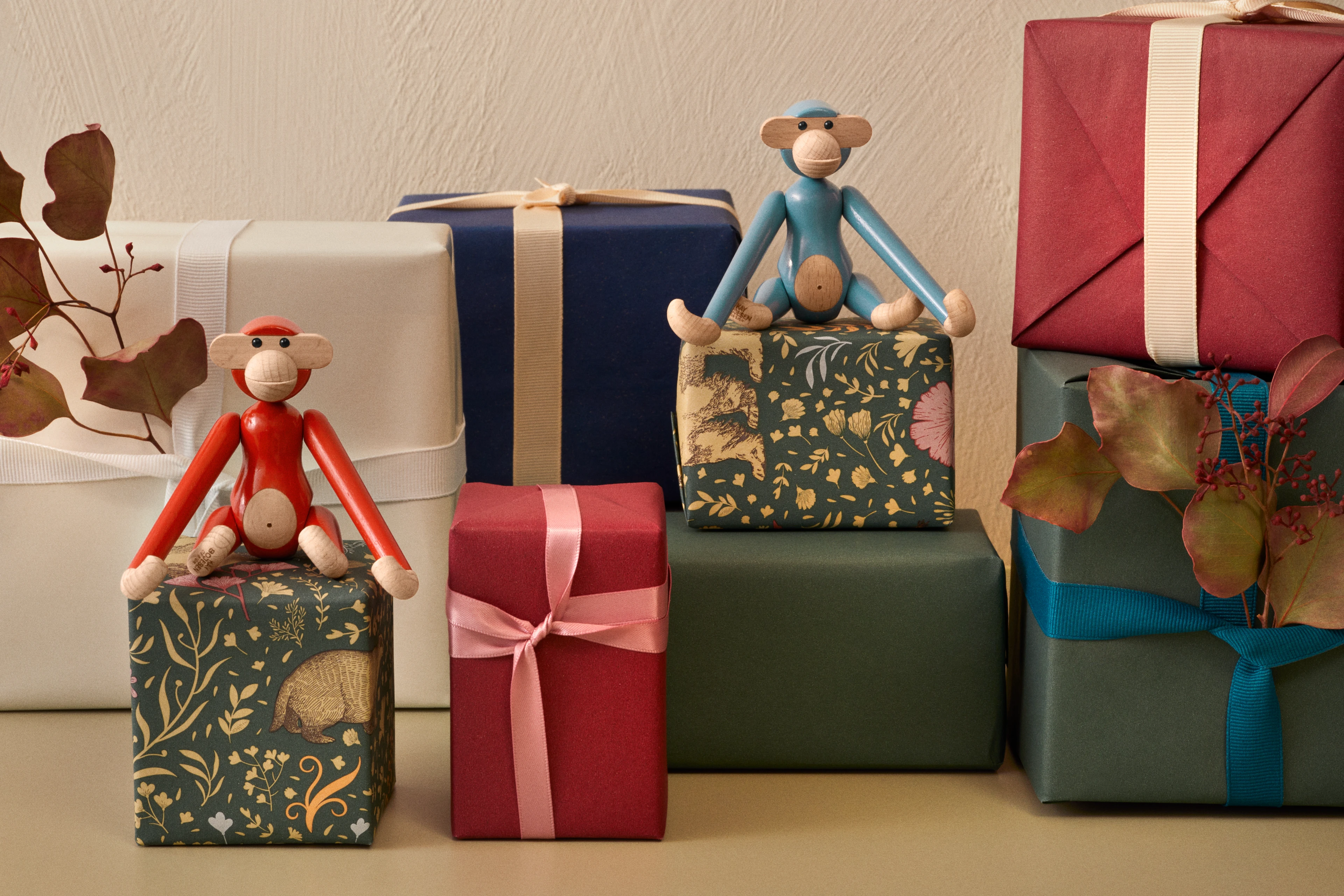 Monkey mini from Kay Bojesen in Vintage red color, made of Wood