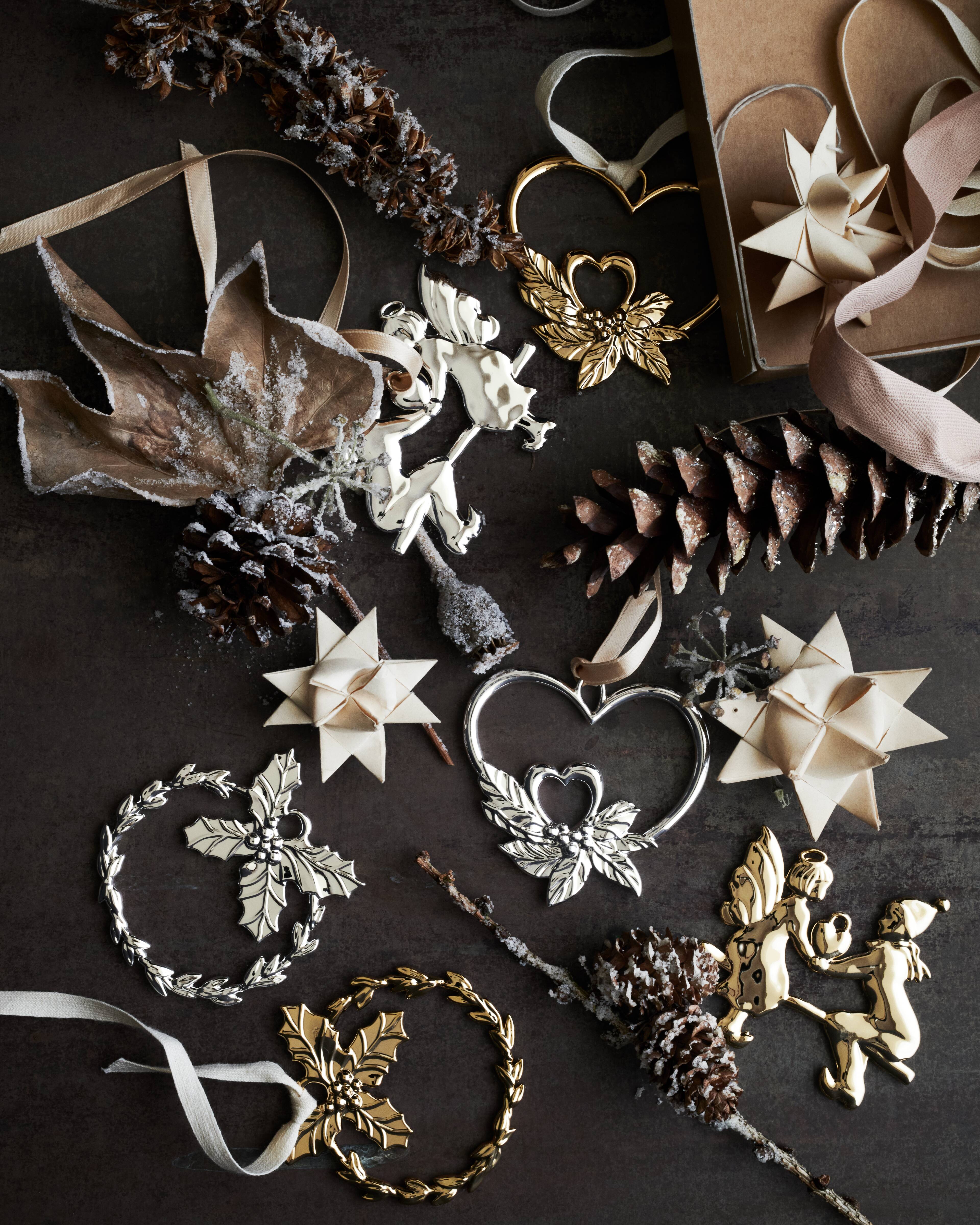 Christmas decorations in gold and silver in a wooden box