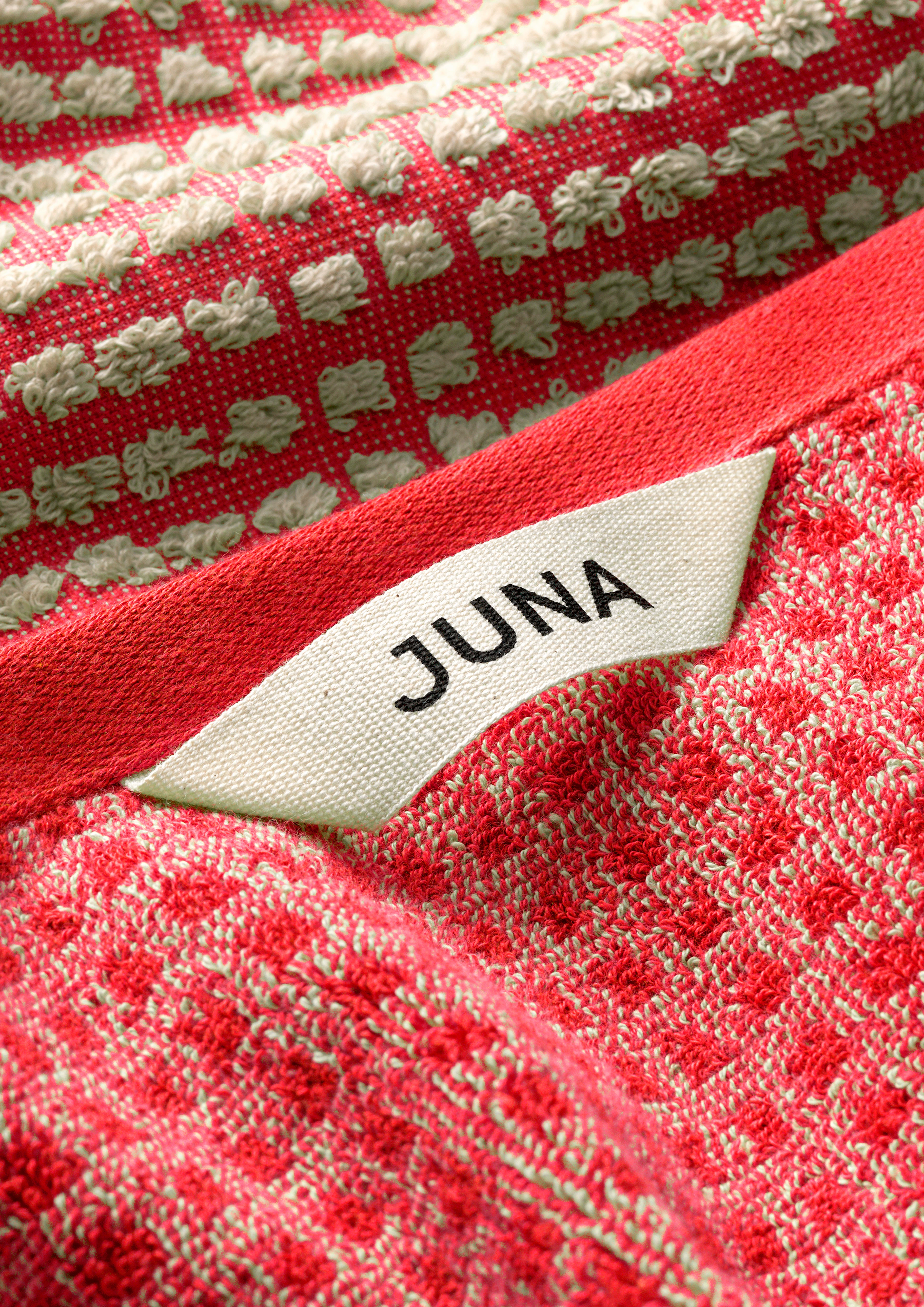 Towel 50x100 cm from JUNA in Red/Sand color, made of Cotton