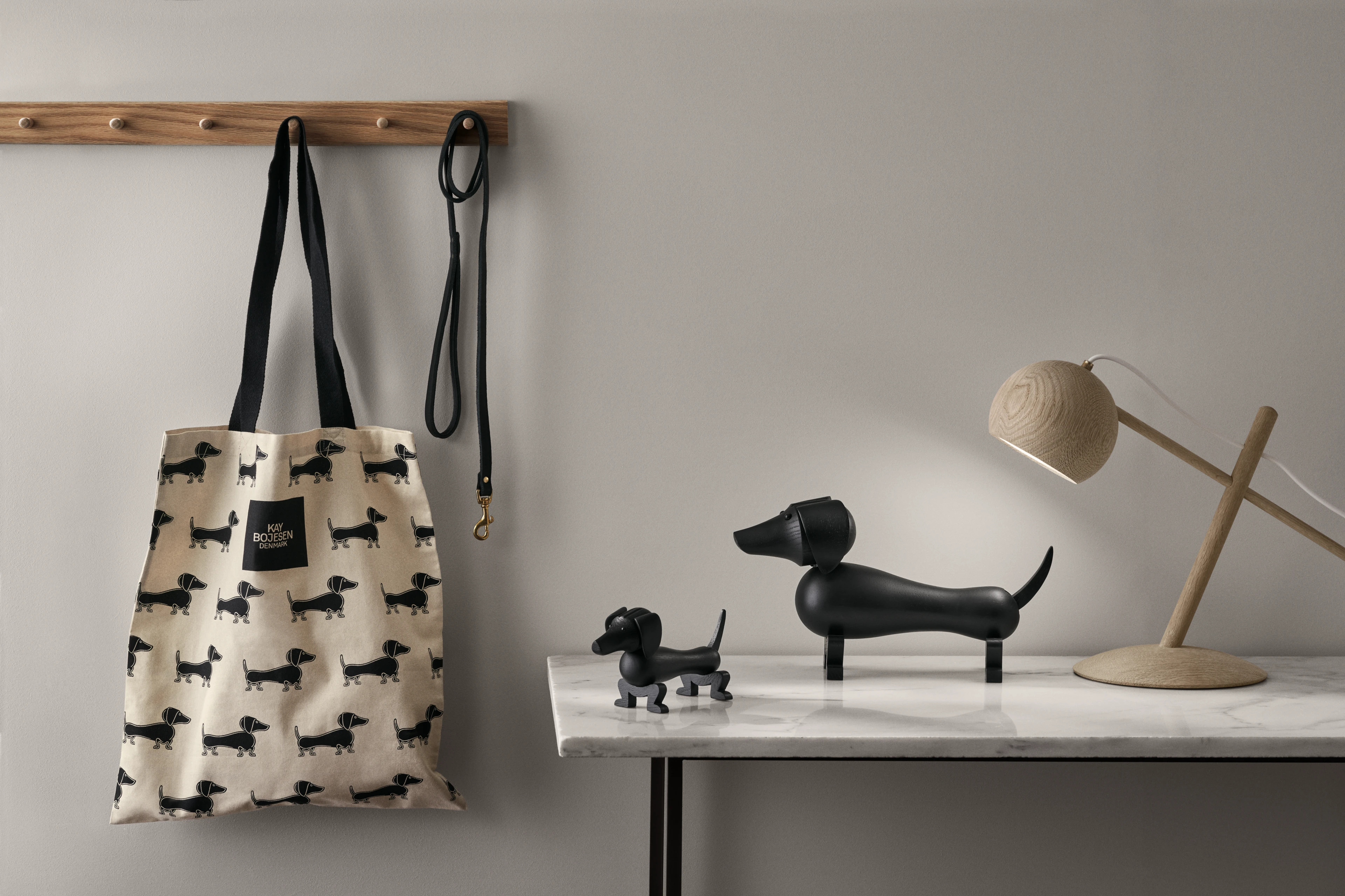 Dog small from Kay Bojesen in Dark stained oak color, made of Wood