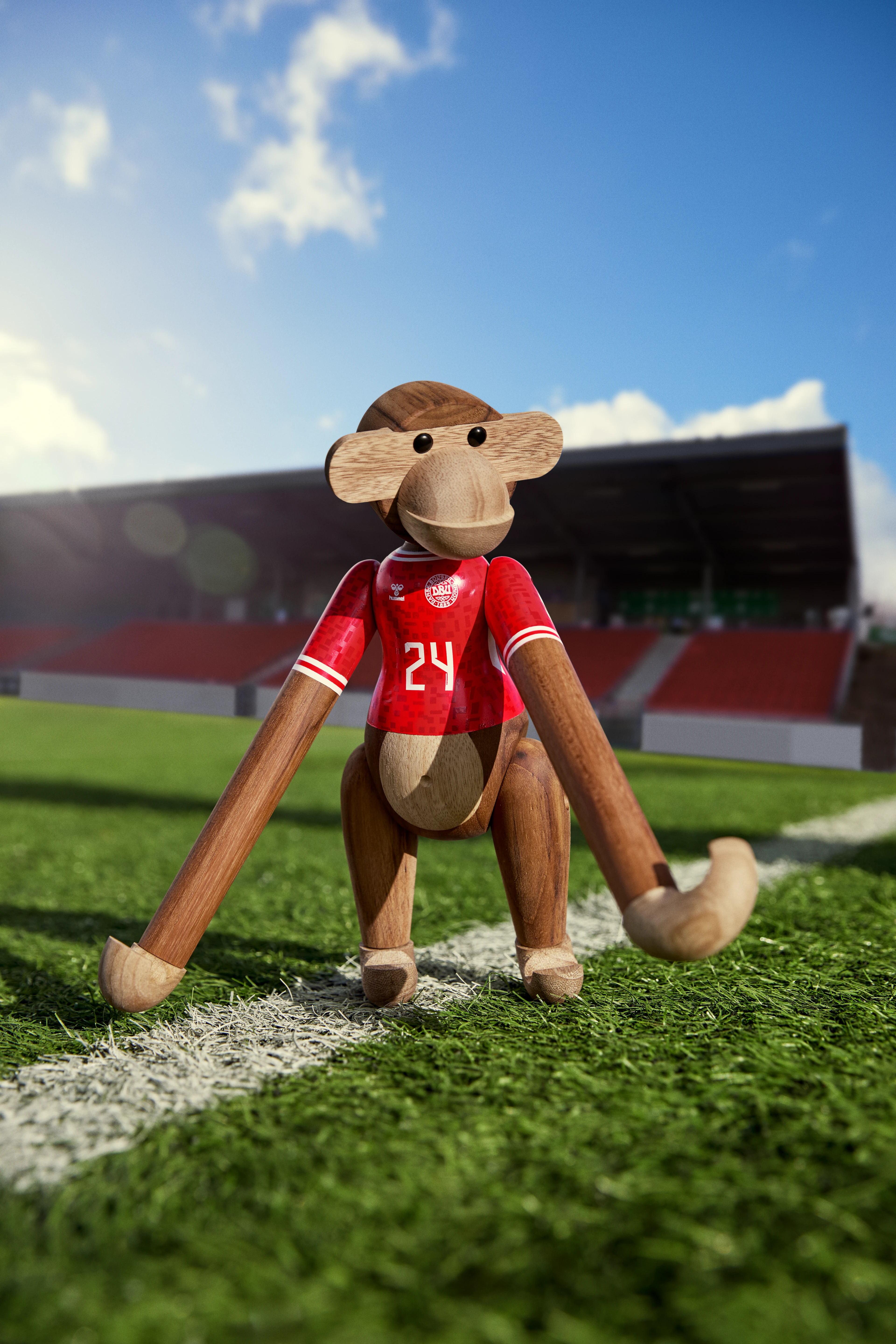 x DBU Man Monkey 2024 medium from Kay Bojesen in Teak/Limba color, made of Wood