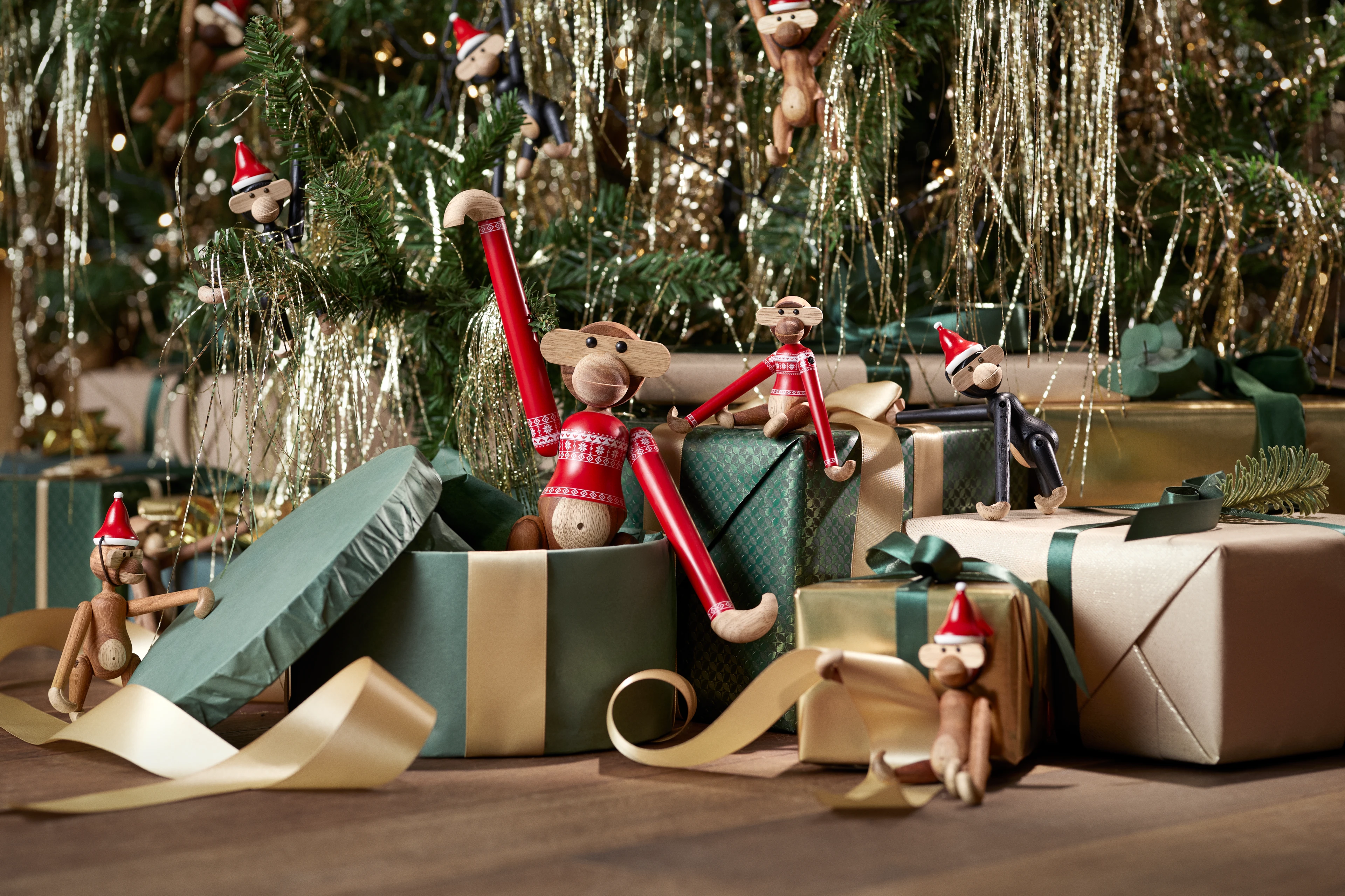 Christmas Jumper Monkey 2024 mini from Kay Bojesen in Teak/Limba color, made of Wood